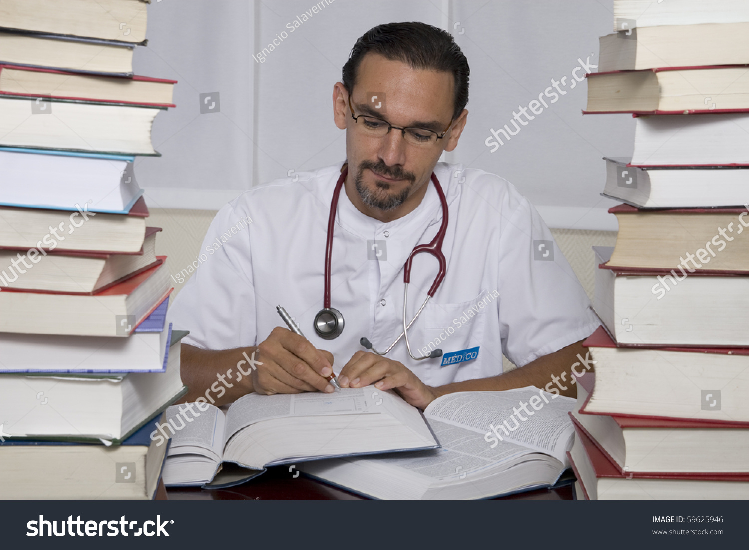 A Doctor Studying In His Office Stock Photo 59625946 : Shutterstock