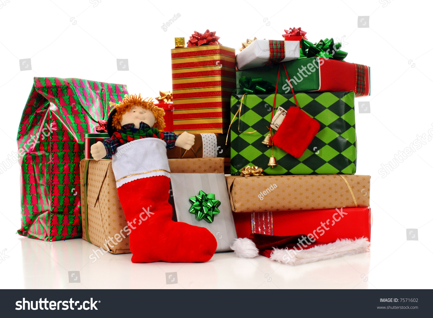 a large pile of colorfully wrapped christmas gifts a large pile of colorfully wrapped christmas gifts