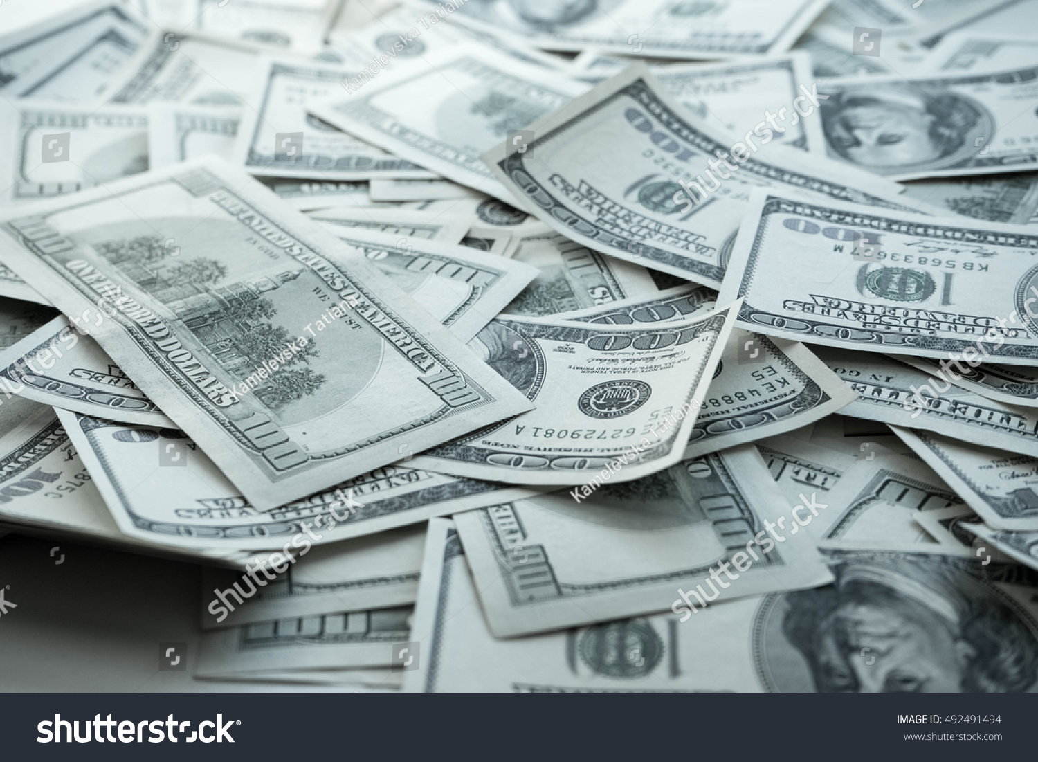 a-lot-of-dollars-a-lot-of-money-stock-photo-492491494-shutterstock