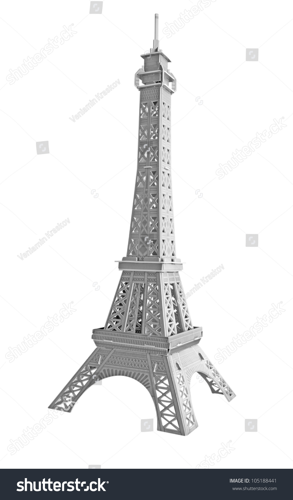 A Model Eiffel Tower Of Cardboard Isolated On White. Clipping Path