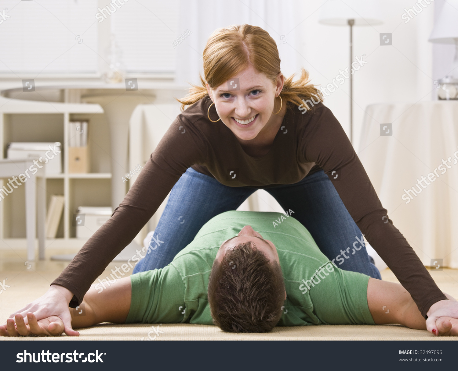 Playful Young Woman Pinning Man Floor Stock Photo 32497096 Shutterstock