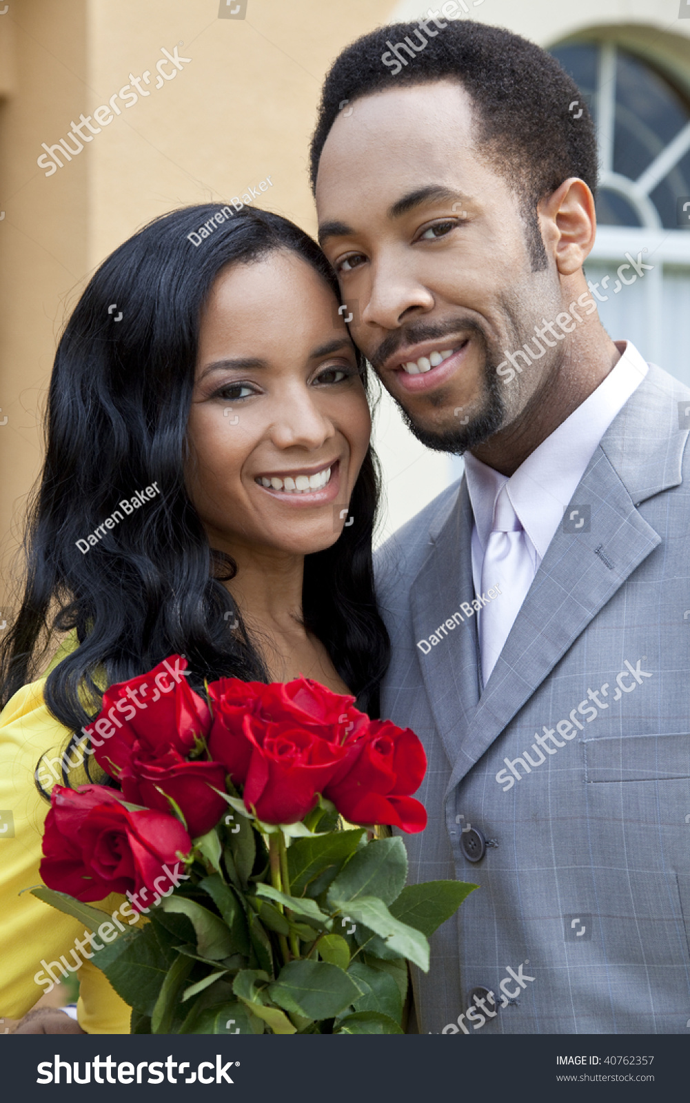 http://image.shutterstock.com/z/stock-photo-a-romantic-and-happy-african-american-man-and-woman-couple-in-their-thirties-smiling-together-with-40762357.jpg