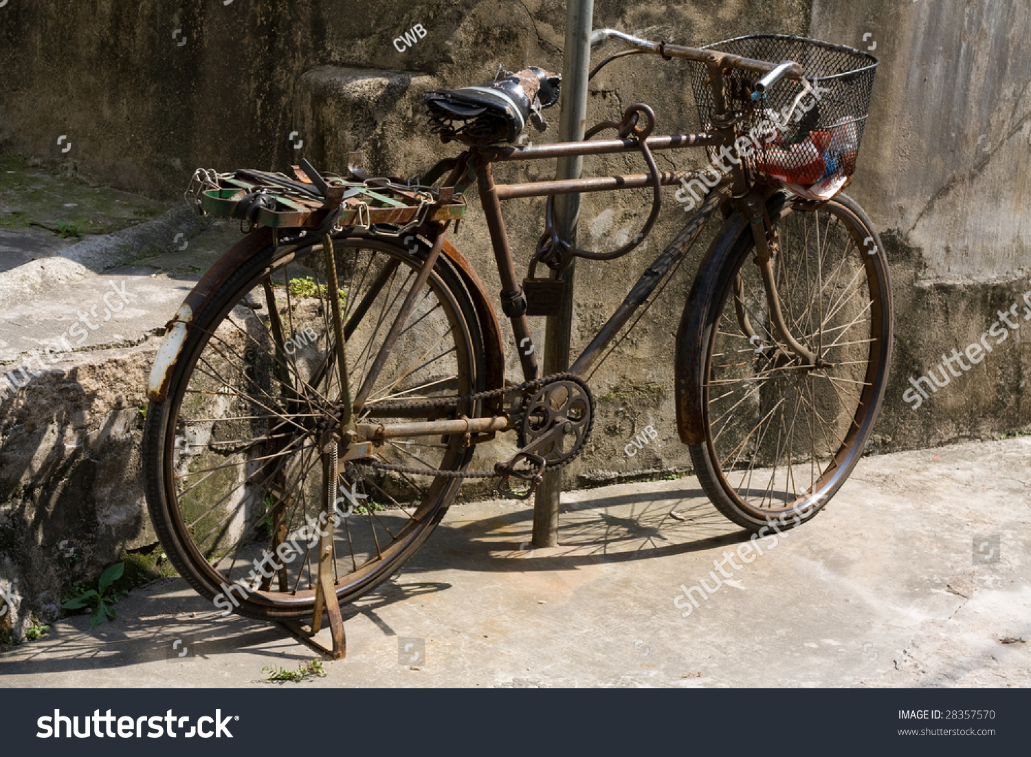 A Rusty Old Chinese Bicycle By The Side Of The Road Stock Photo 