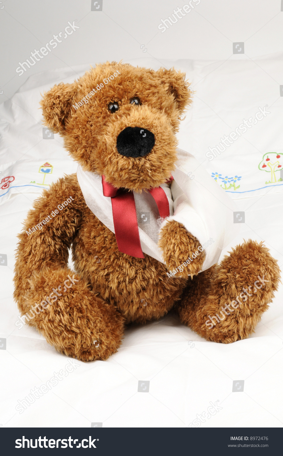 broken arm teddy bear