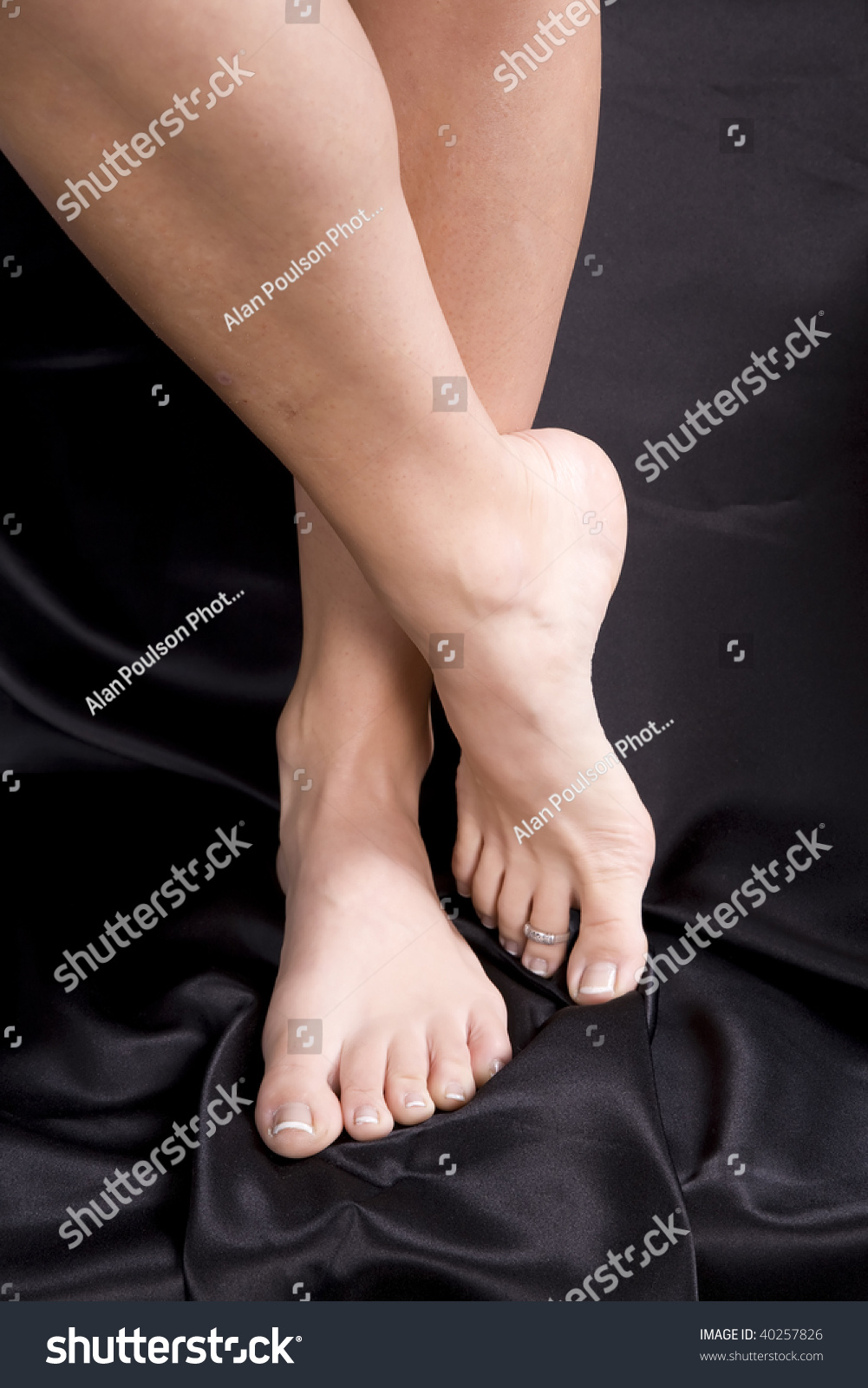 Womans Feet Crossed Ankles On Black Stock Photo Shutterstock