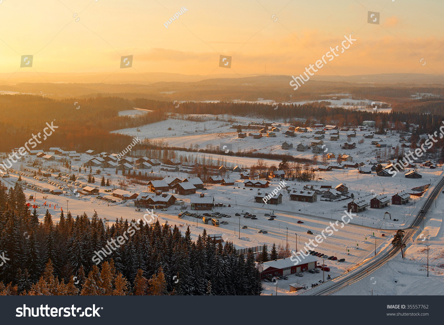 Aerial View Of Nordic Village On Sunny Winter Evening Stock Photo 