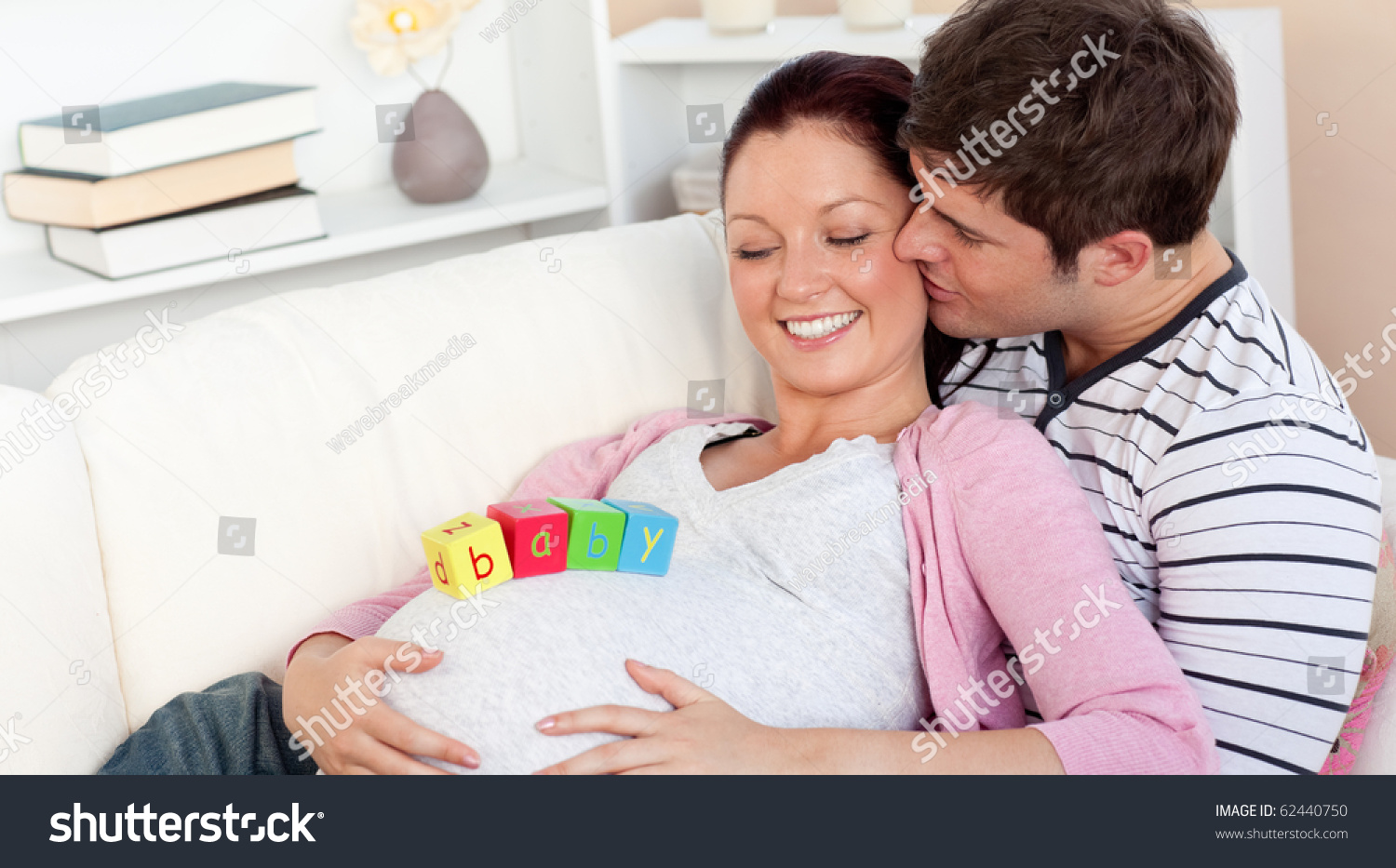 Affectionate Man Kissing His Pregnant Wife Stock Photo Affectionate Man Kissing His Pregnant Wife Stock Photo