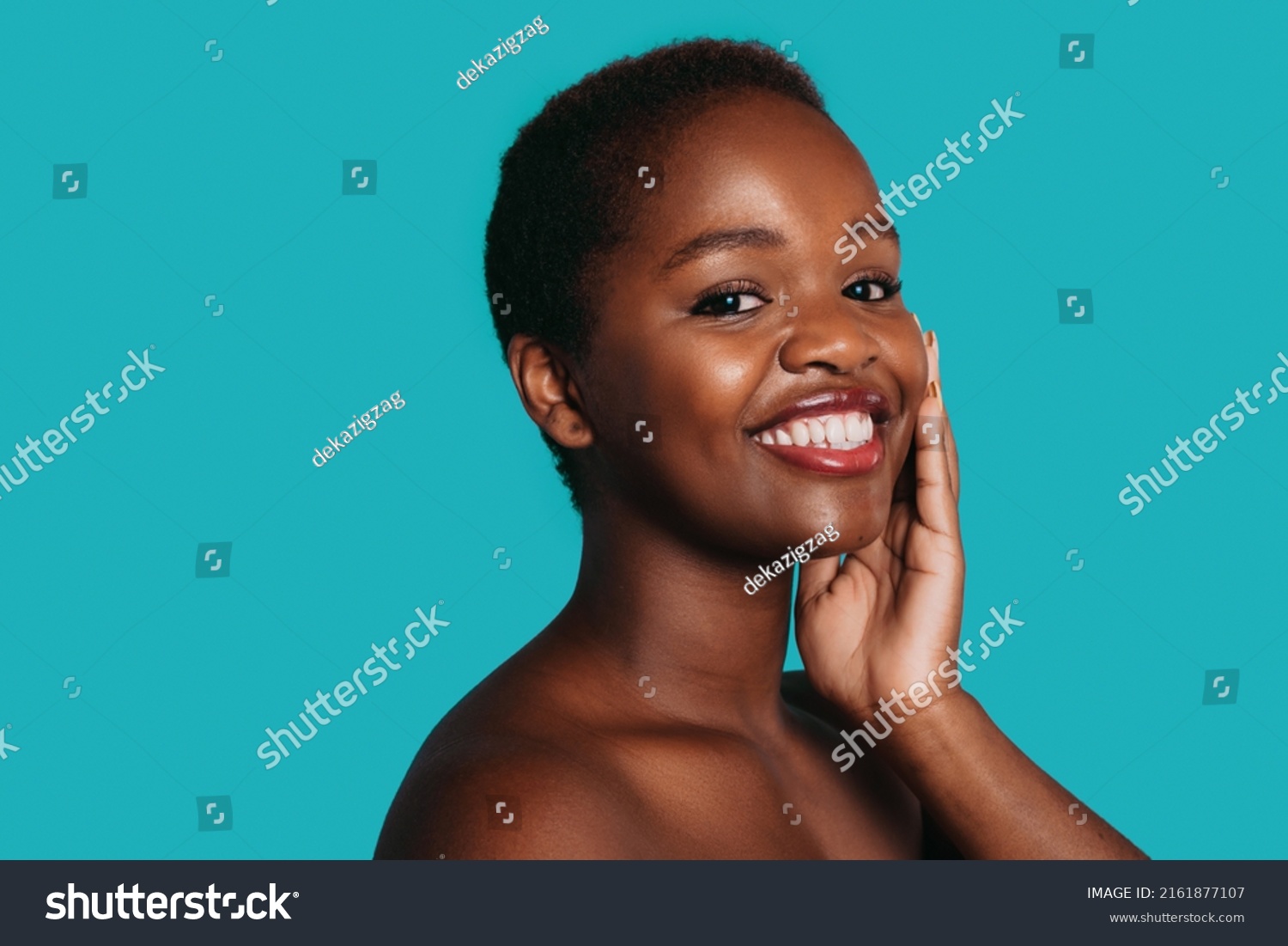 Africanamerican Naked Woman Touching Her Face Stock Photo