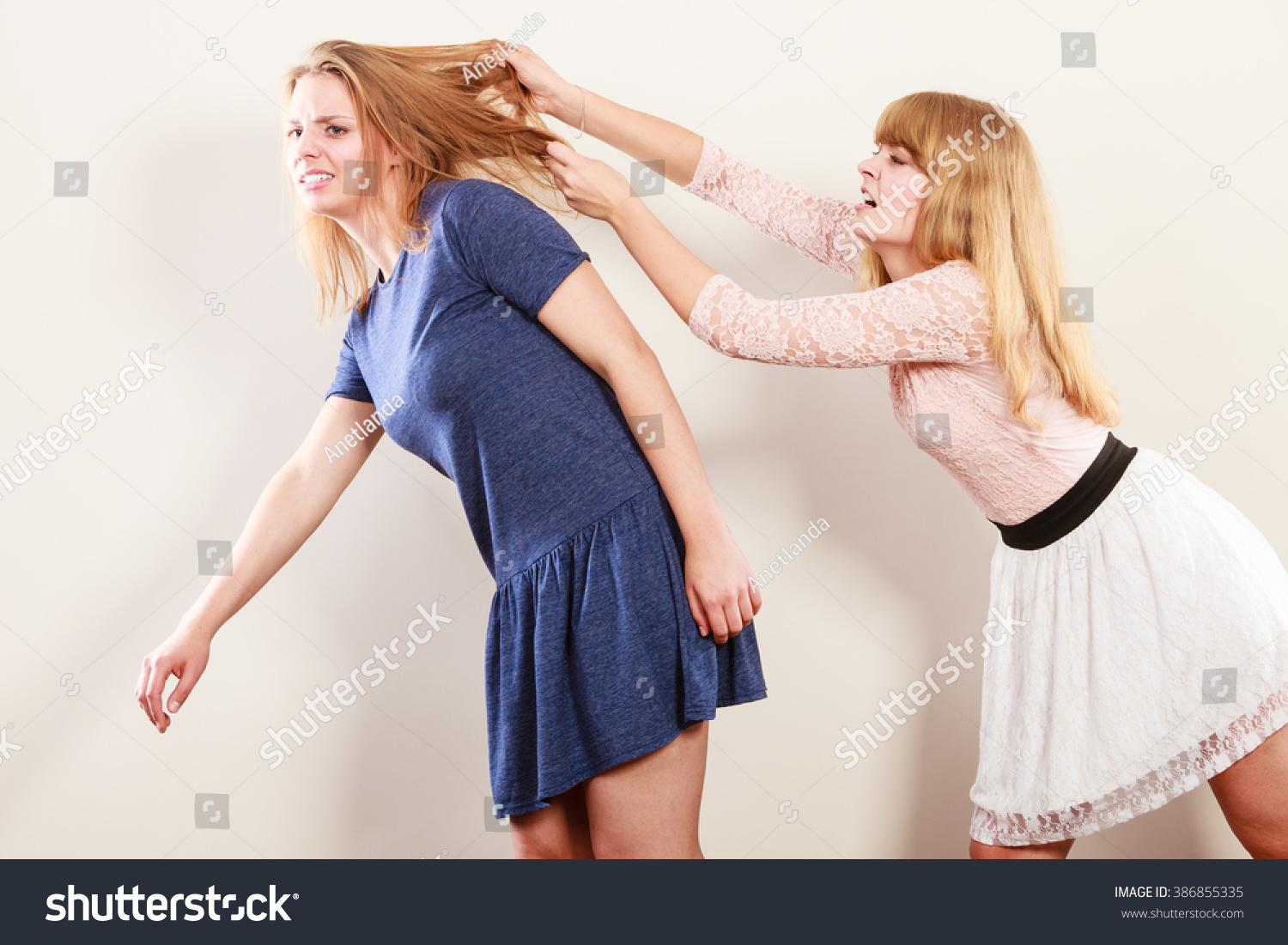 Aggressive Mad Women Fighting Each Other Pulling Hair Two Young