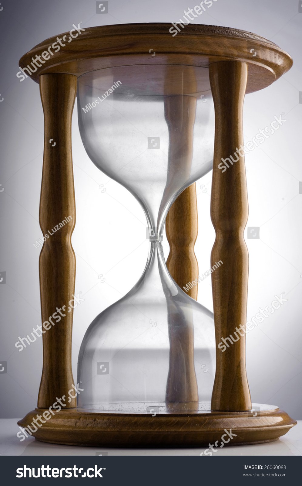 stock-photo-an-empty-hourglass-26060083.