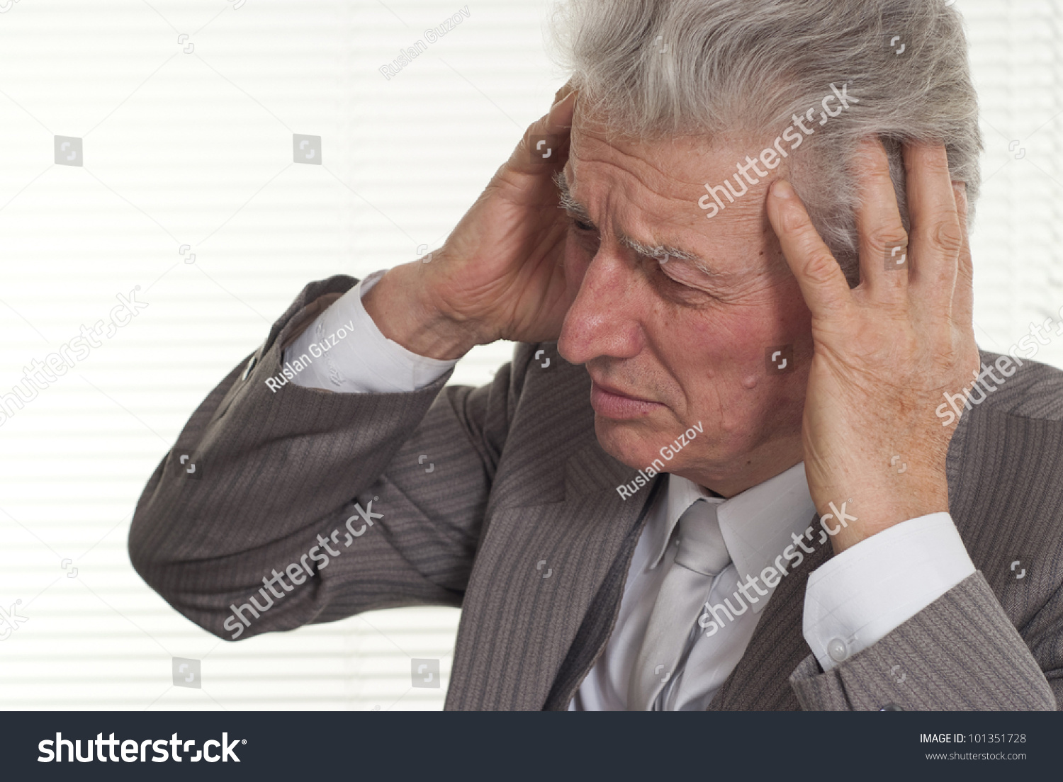 An Old Man Holding His Head On A White Background Stock Photo 101351728 