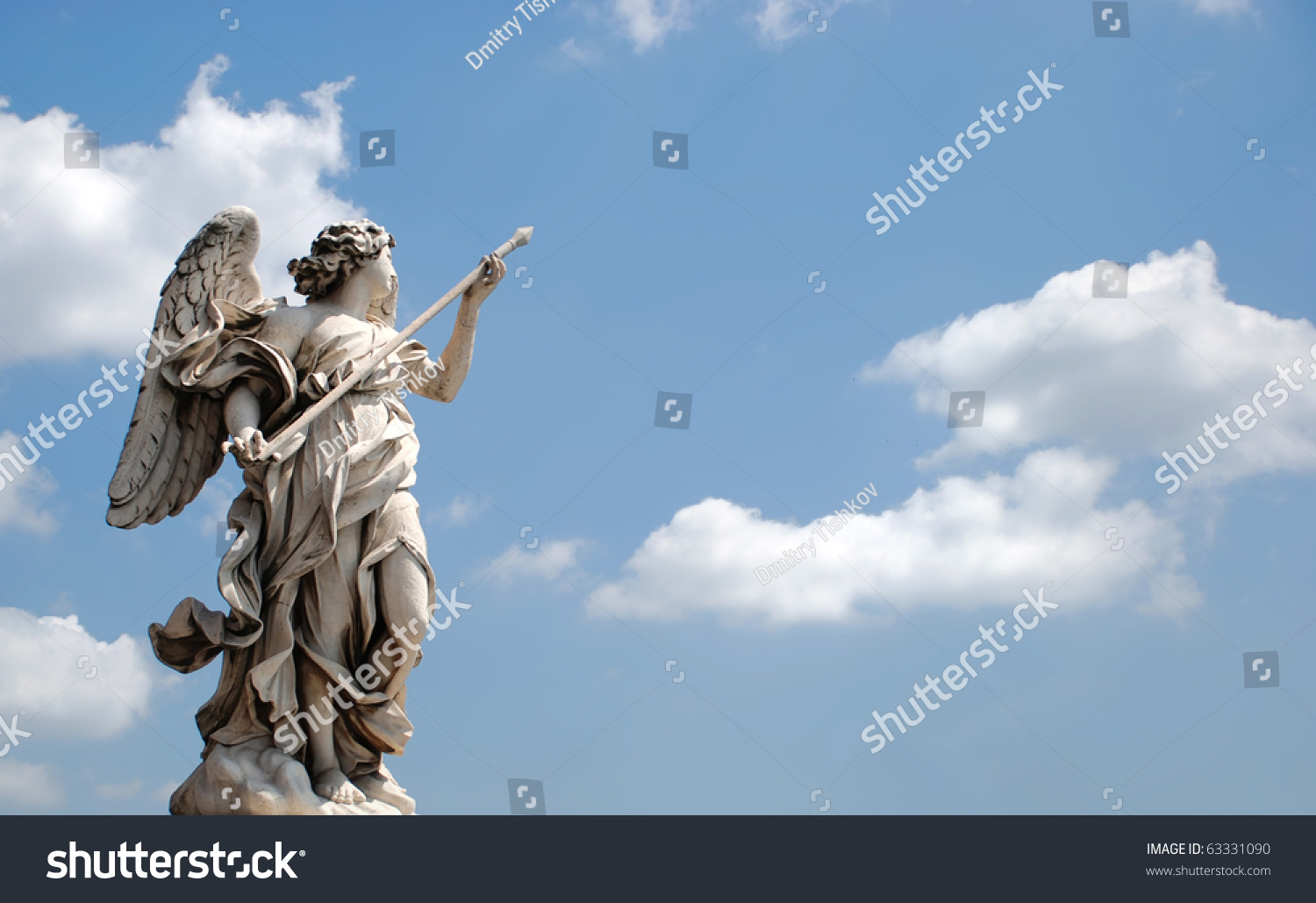 angel-statue-with-arrow-in-the-sky-stock-photo-63331090-shutterstock