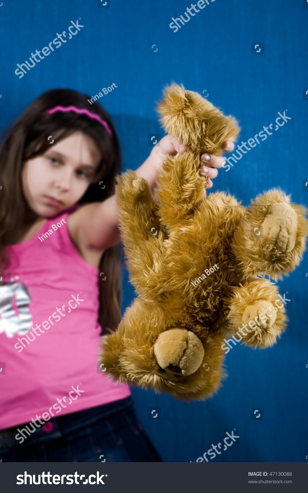 Angry Teenage Girl Holding Ted
