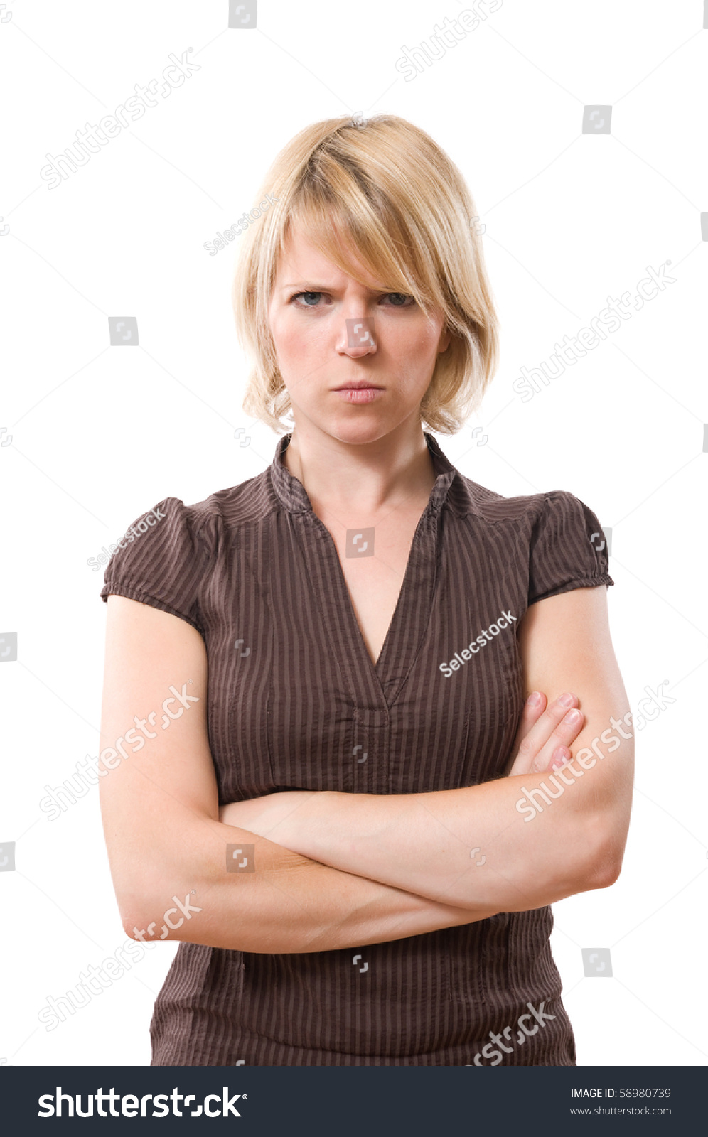 Annoyed Blond Woman With Crossed Arms Isolated On White Stock Photo