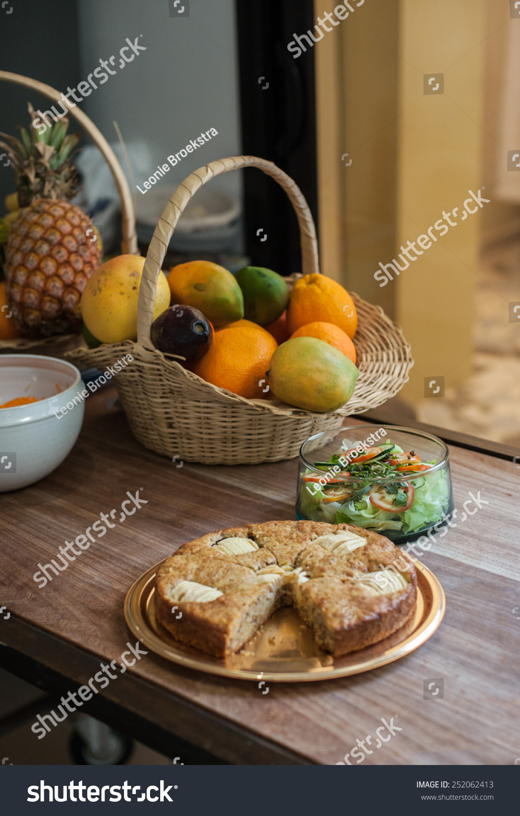 Apple pie salad and fruit in a domestic kitchen Apple pie salad and fruit in a domestic kitchen