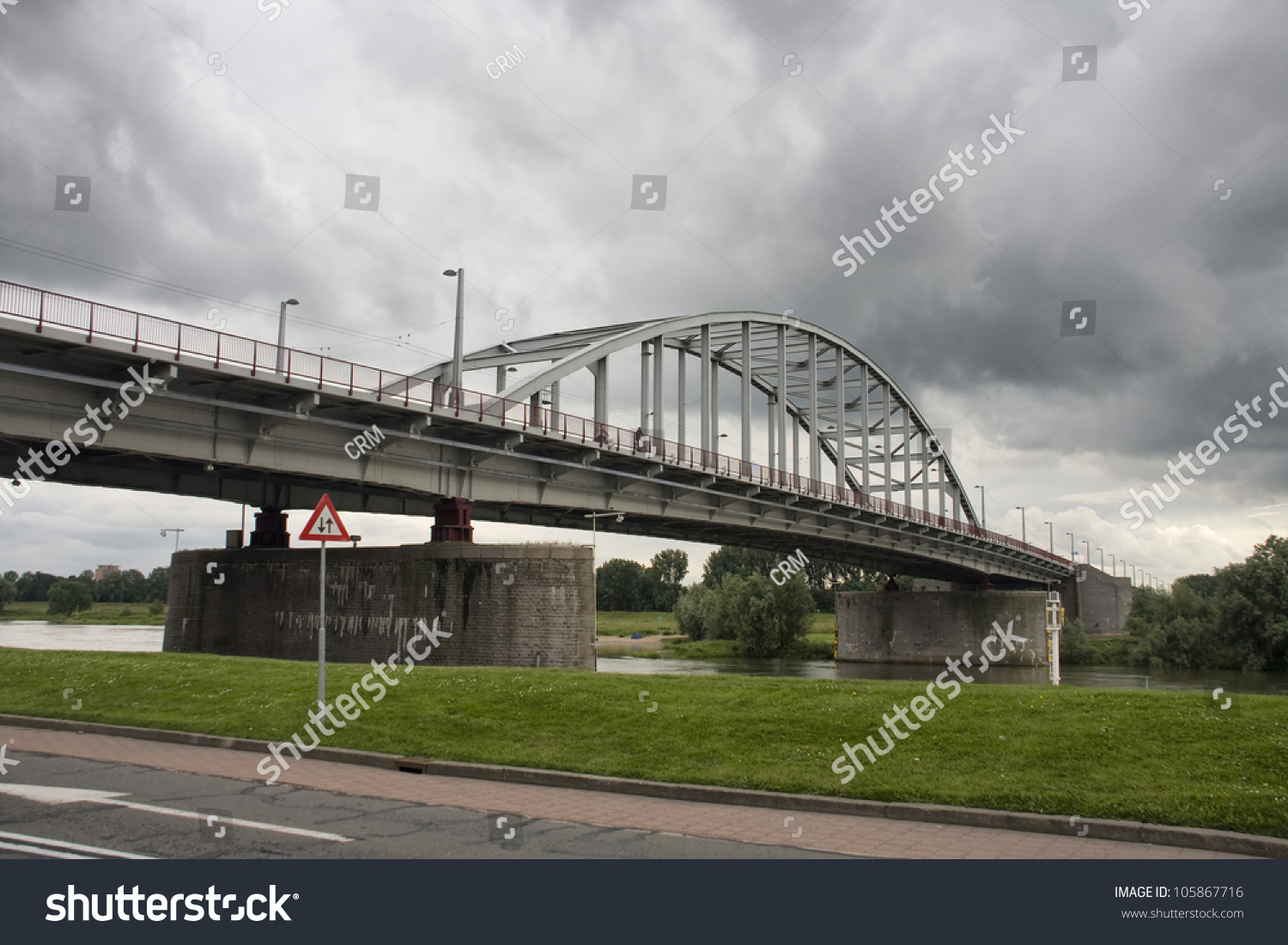 stock-photo-arnhem-bridge-john-frost-bridge-scenic-of-world-war-battle-during-market-garden-airborne-105867716.jpg