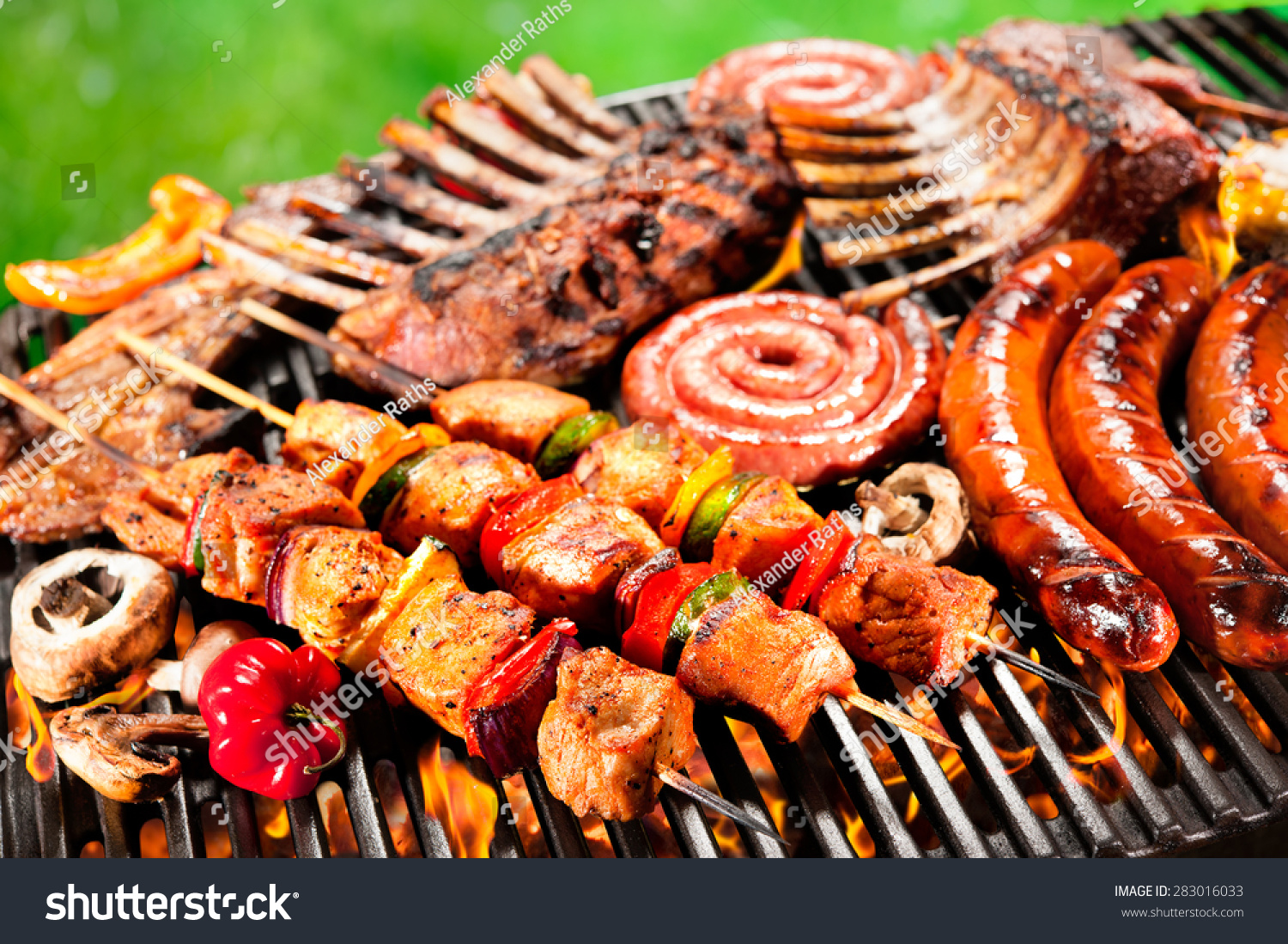 Assorted Delicious Grilled Meat With Vegetable Over The Coals On A ...