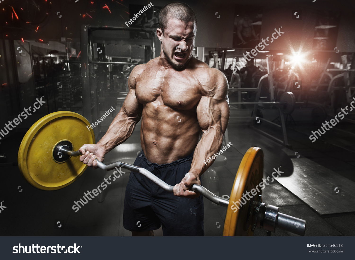 Athlete Muscular Bodybuilder Gym Training Bar Shutterstock