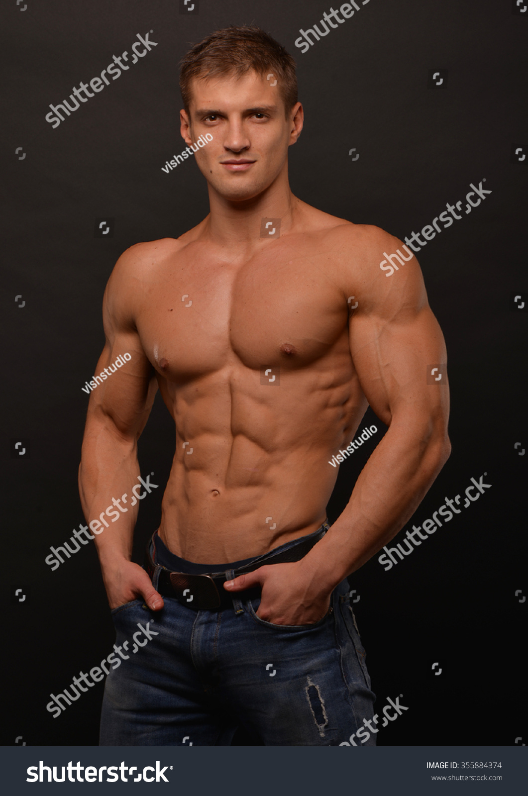 Athletic Shirtless Male Model Flexing Muscles Shutterstock