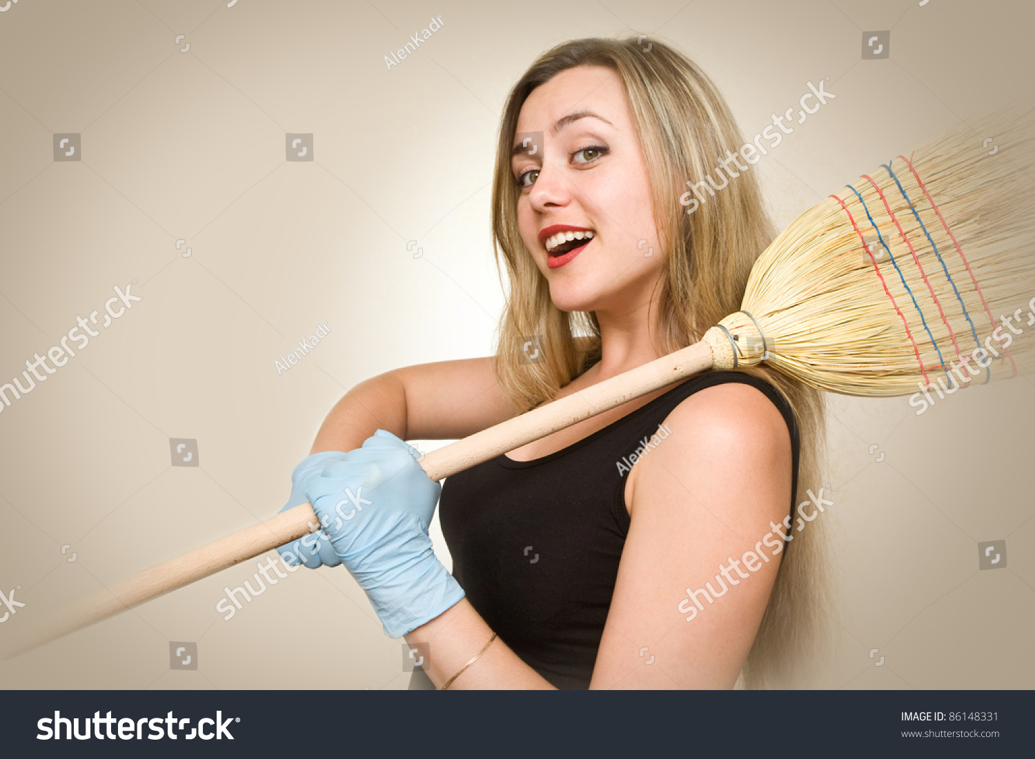 Attractive And Sexy Housewife Is Going To Fight Dirty Stock Photo