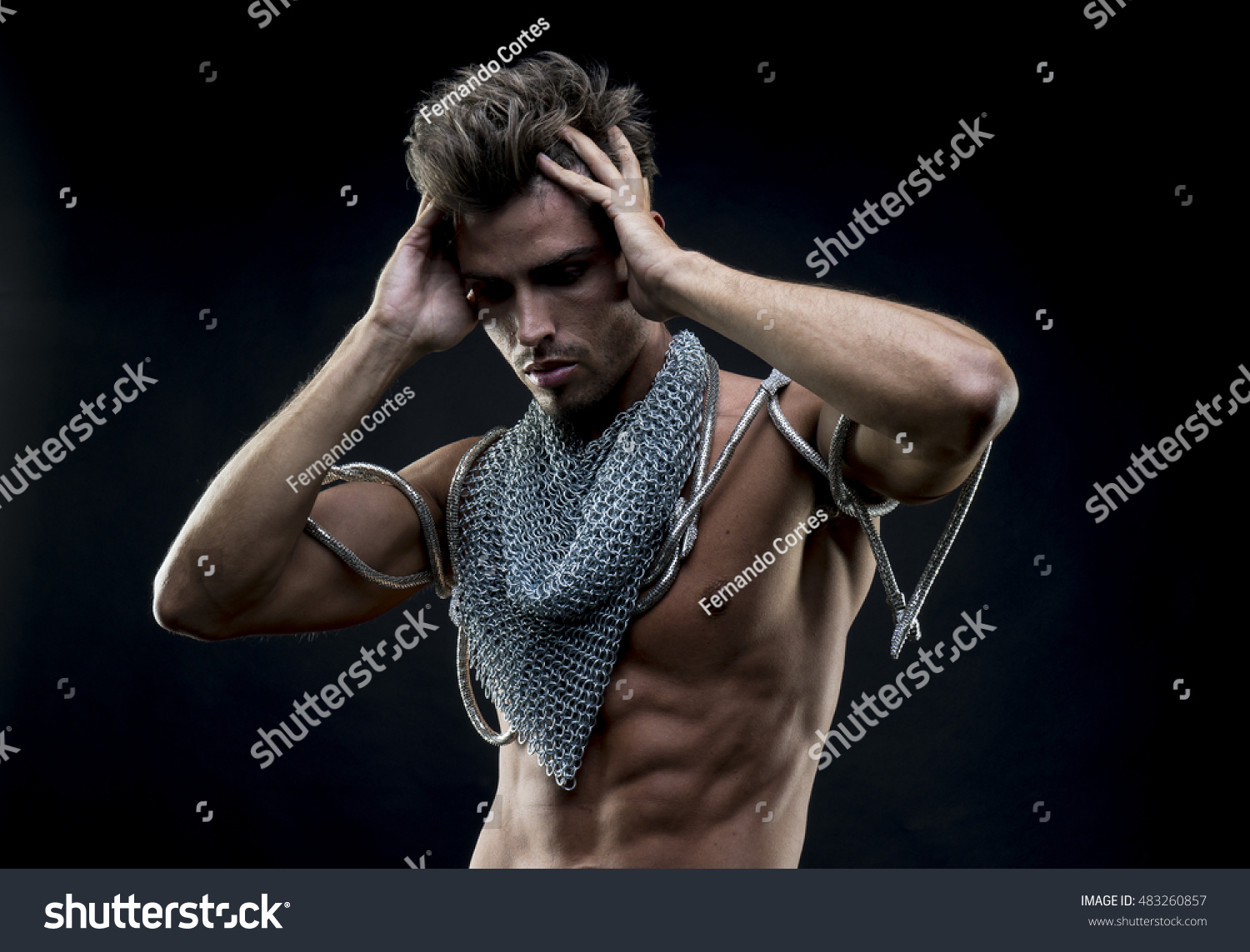 Attractive Naked Man Abdominal Chain Mesh Stock Photo