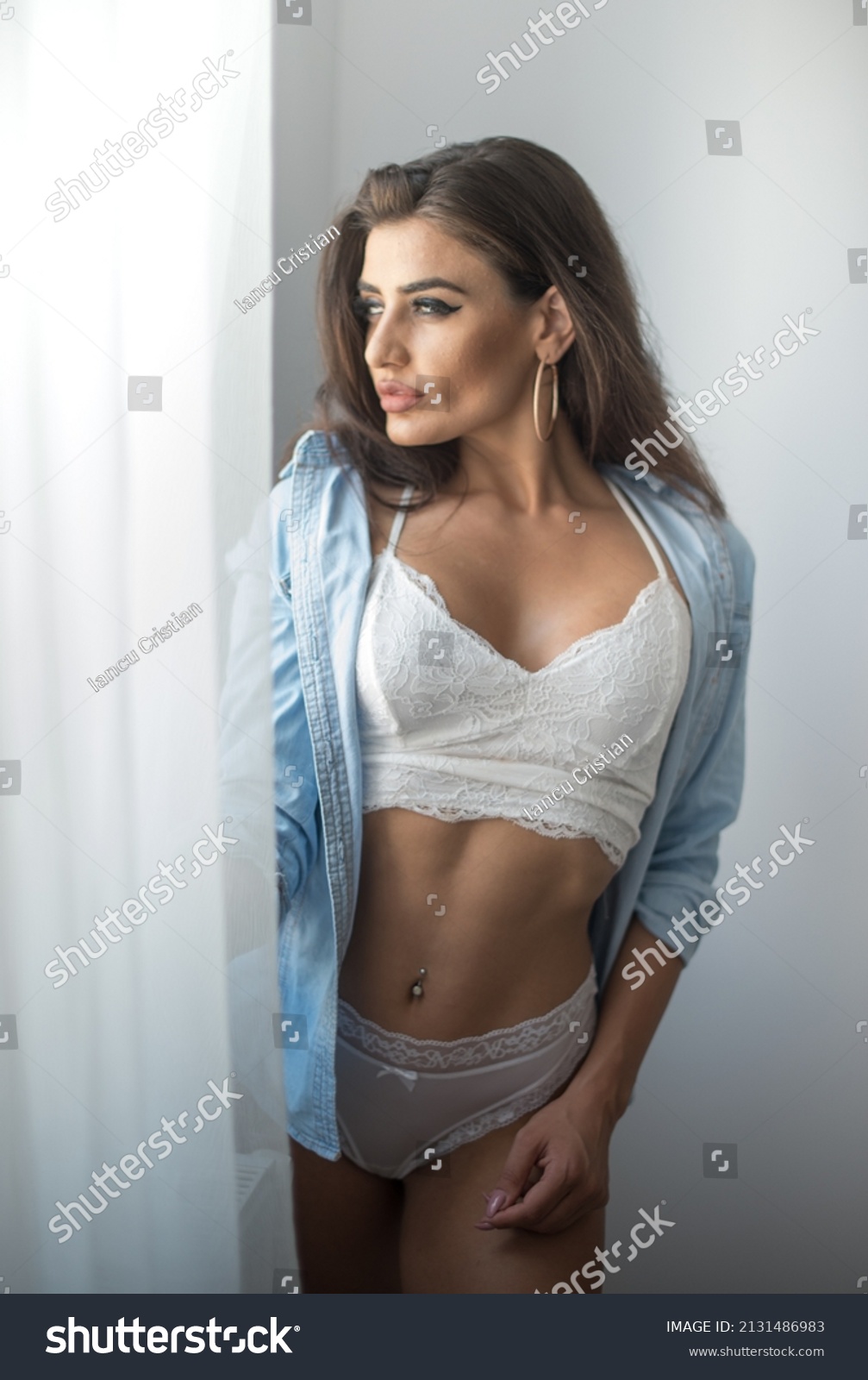 Attractive Sexy Brunette White Lingerie Denim Stock Photo