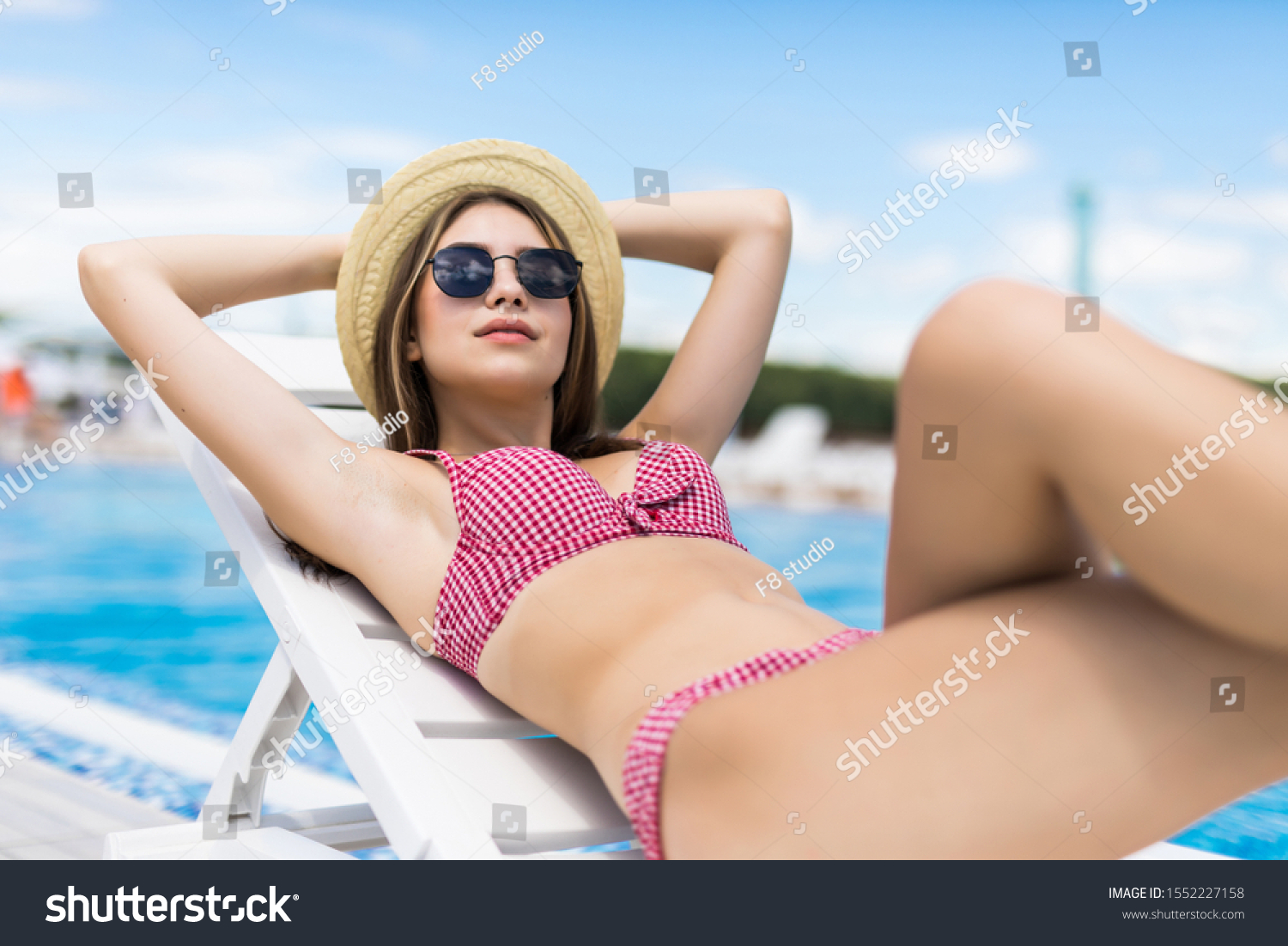 Attractive Woman Bikini Sits By Poolside Stock Photo Edit Now