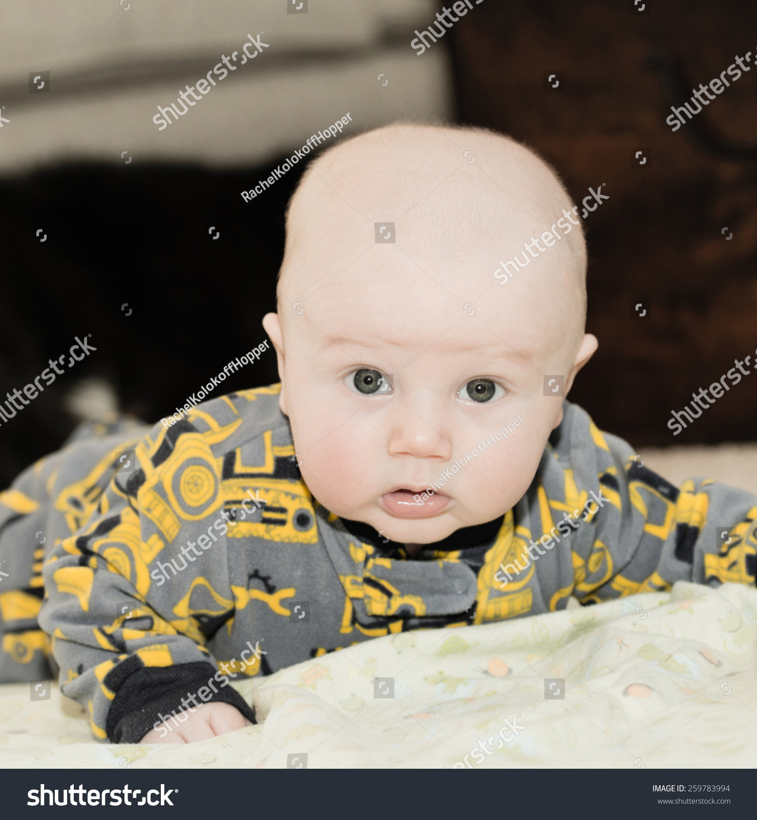 Baby looks around during <b>timmy time</b>! - stock-photo-baby-looks-around-during-timmy-time-259783994