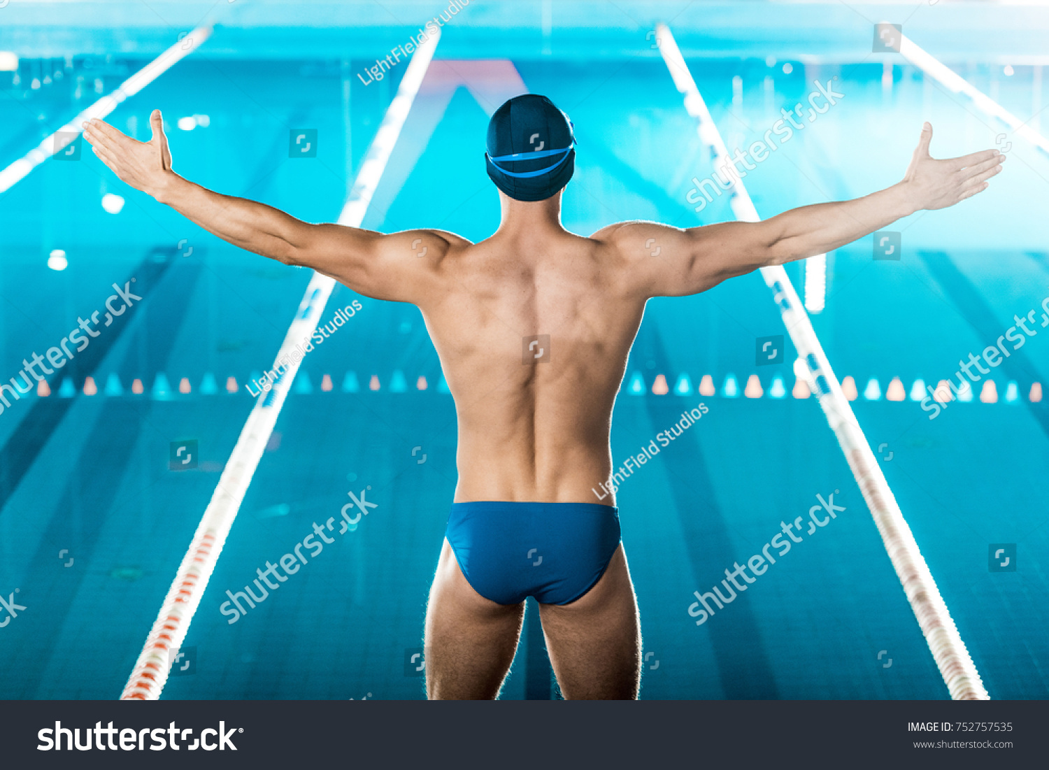 Back View Muscular Swimmer Swimming Cap Stock Photo