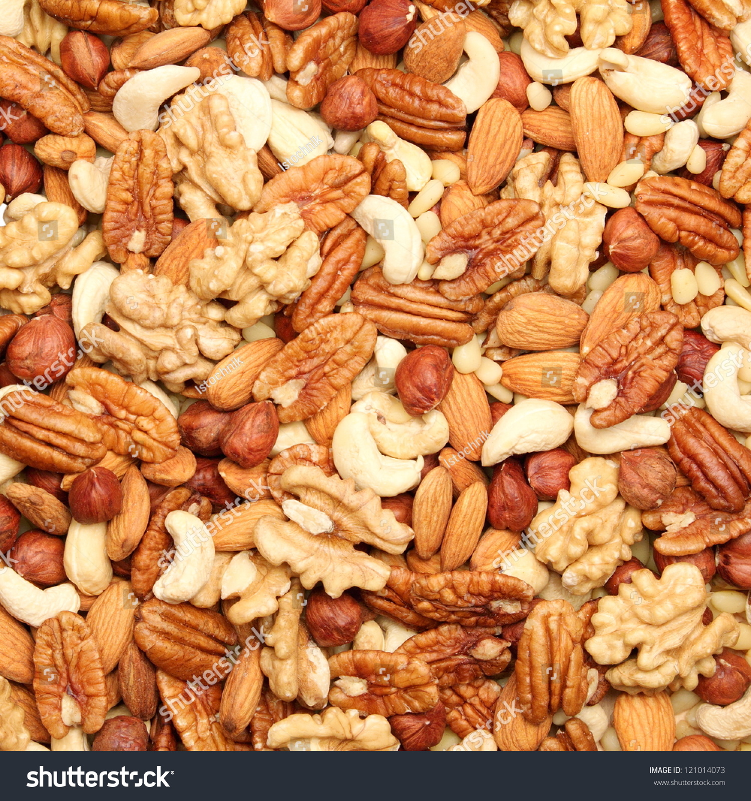 stock-photo-background-of-mixed-nuts-pecans-hazelnuts-walnuts-cashews-almonds-pine-nuts-pistachios-121014073.jpg