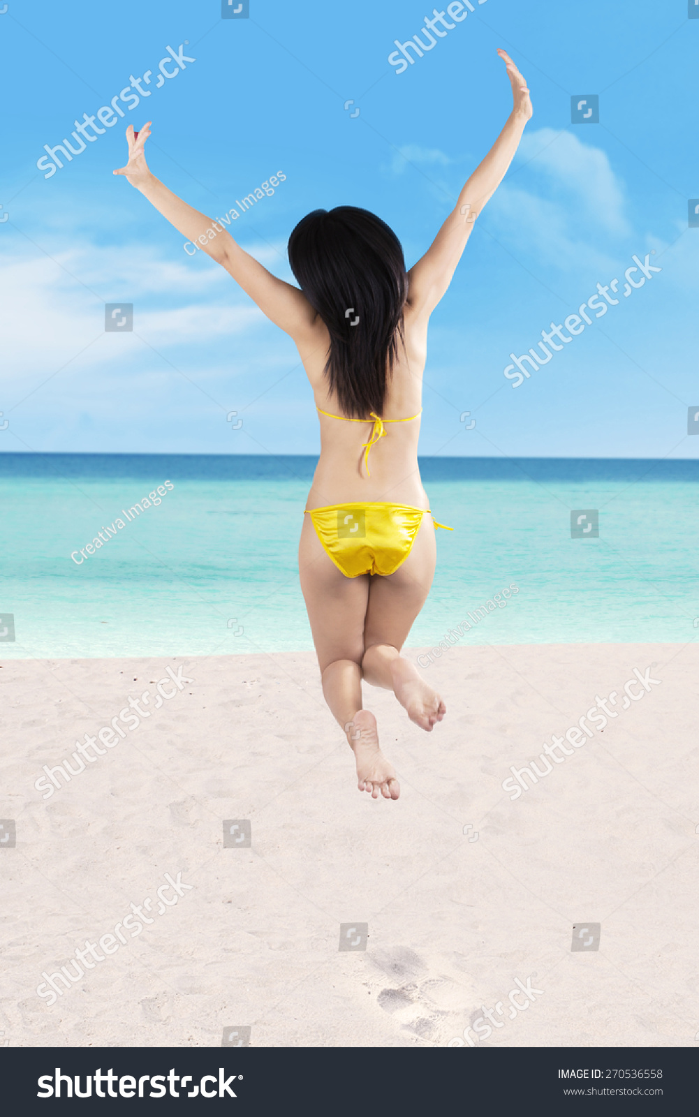 Backside Beautiful Sexy Woman Bikini Jumping Stock Photo 270536558