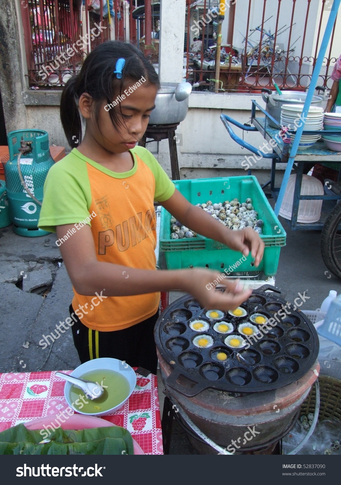Bangkok, Thailand - January 6: Thai Young Girl Cooking Eggs On The