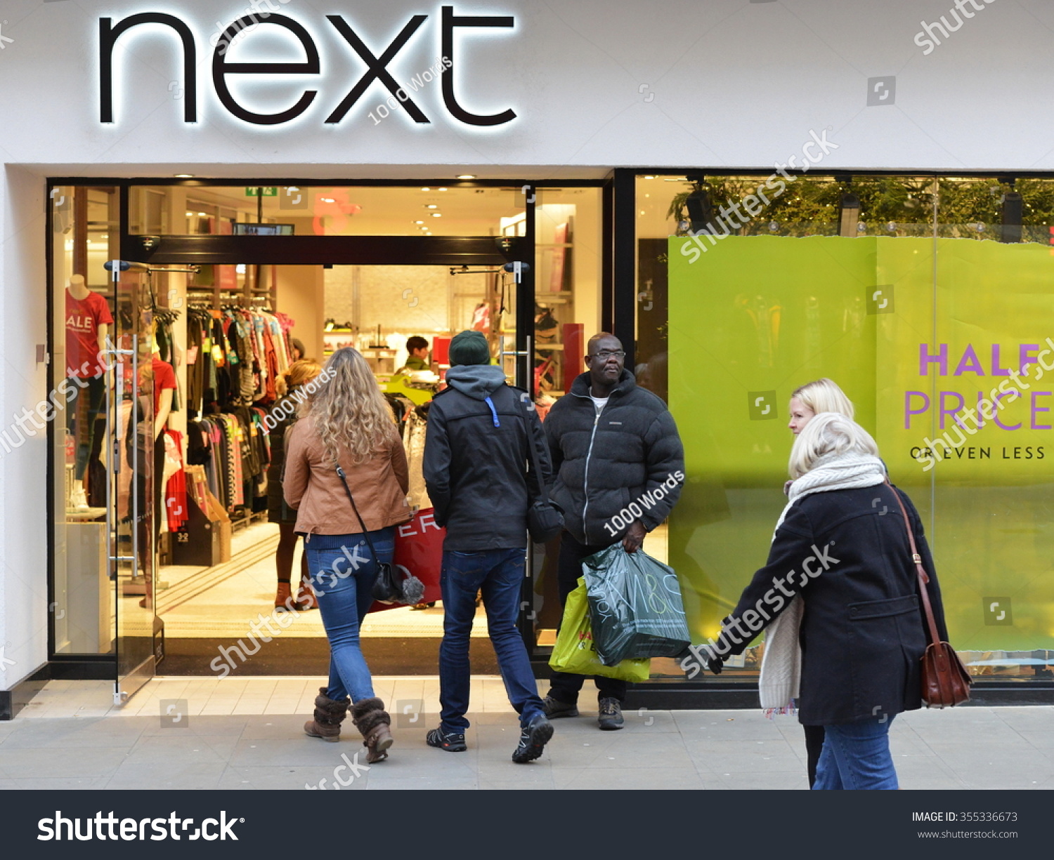 BATH UK DEC 26 2014 People visit stores in Southgate shopping district for the Boxing Day Sales Many stores across the country traditionally hold sales on Boxing Day with have discounted goods BATH UK DEC 26 2014 People visit stores in Southgate shopping district for the Boxing Day Sales Many stores across the country traditionally hold sales on Boxing Day with have discounted goods