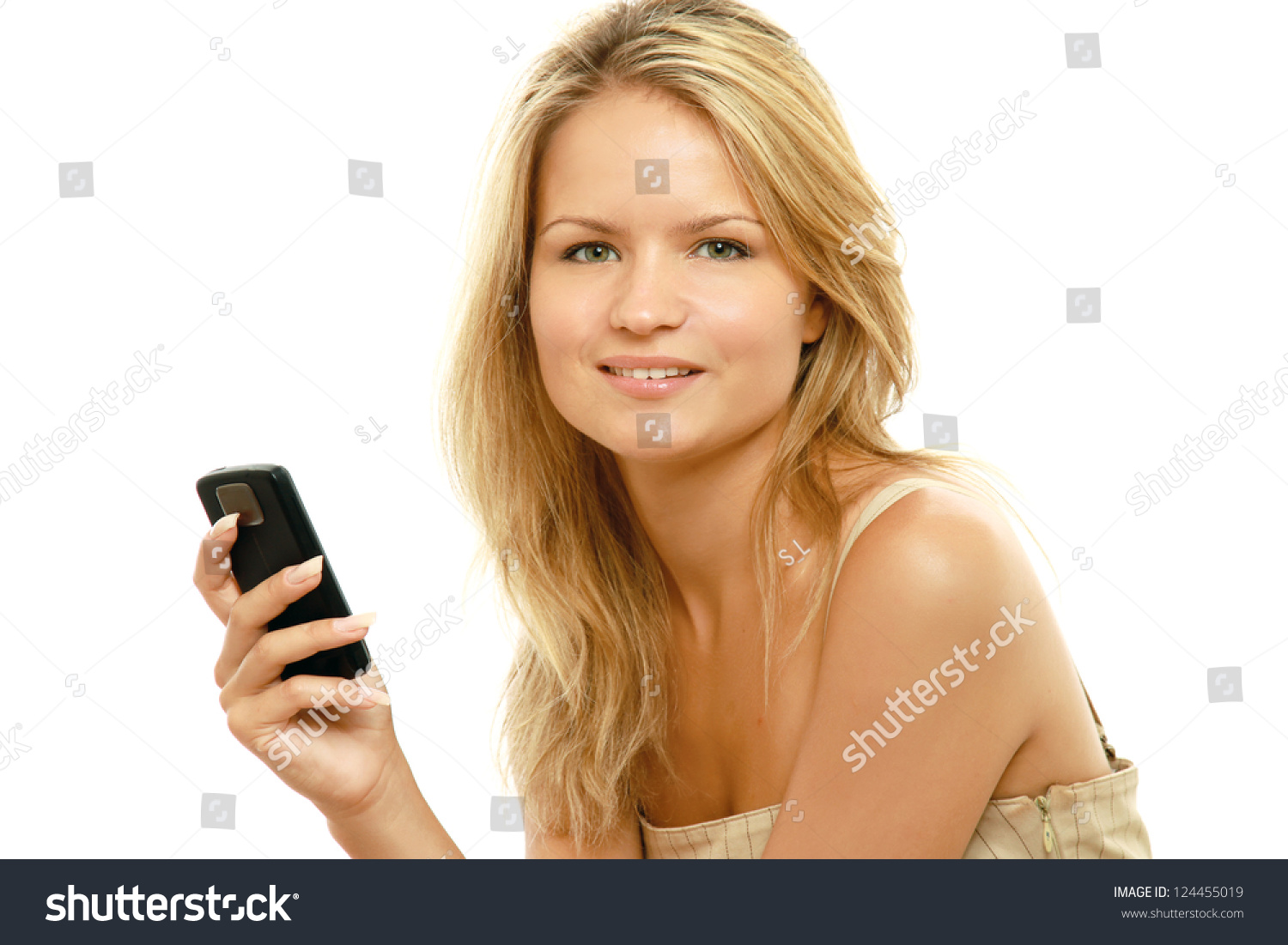 Beautiful Caucasian Woman Holding Cell Phone In Hand Against White