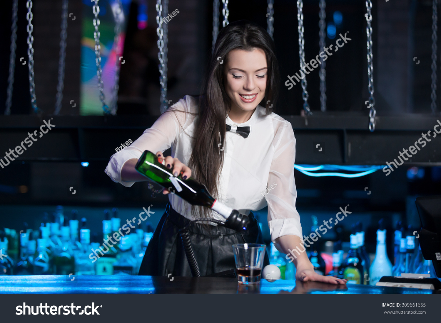 Beautiful Cheerful Brunette Bartender Girl In White Shirt And Black Bow Tie Serving Alcohol 