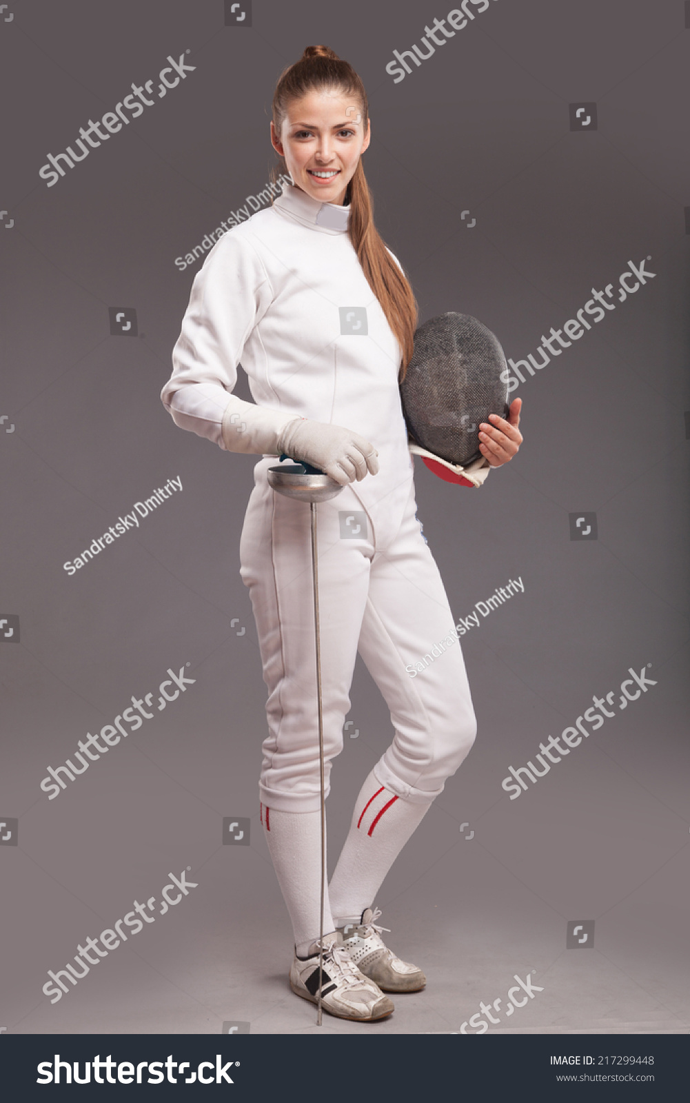 beautiful-girl-woman-with-sword-in-fencing-costume-and-fencing-mask-stock-photo-217299448