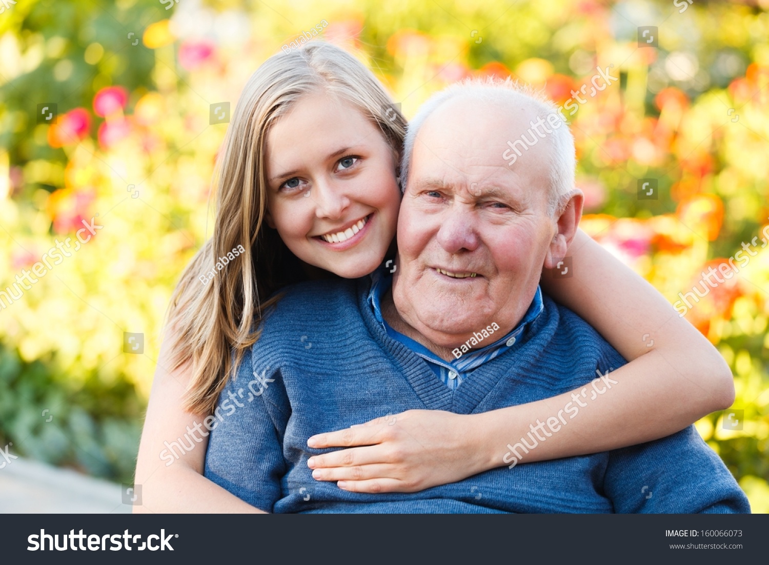 Beautiful Granddaughter Visiting Her Elderly Kind Grandfather. Stock ...