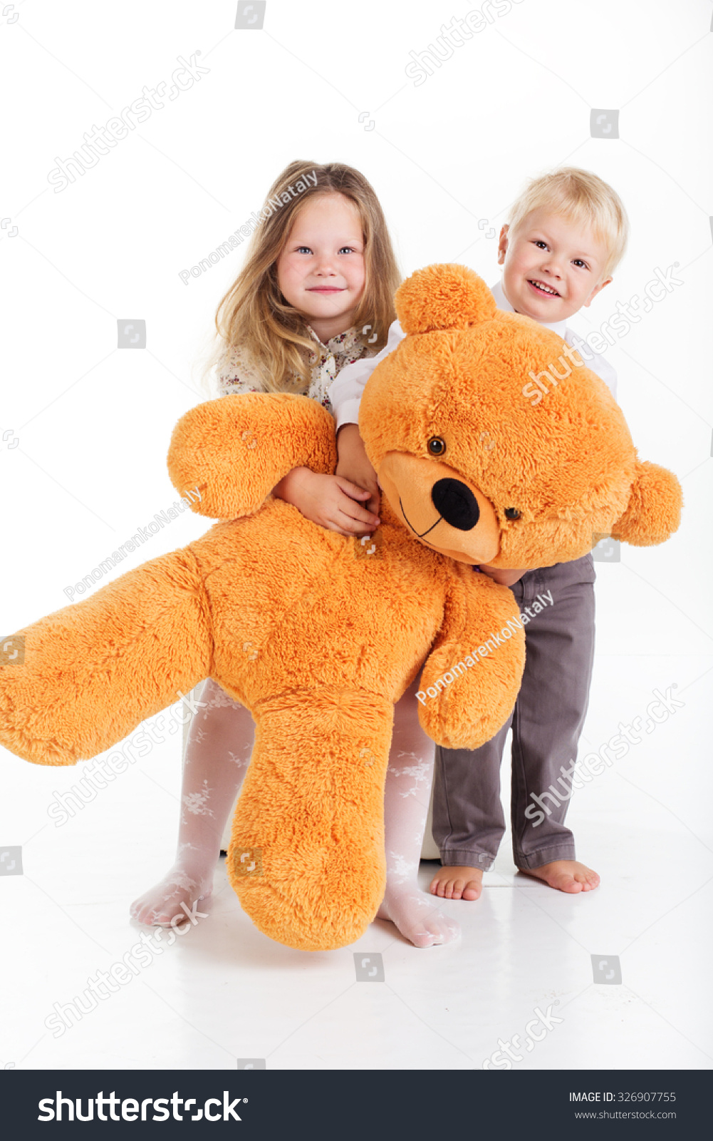 child with teddy