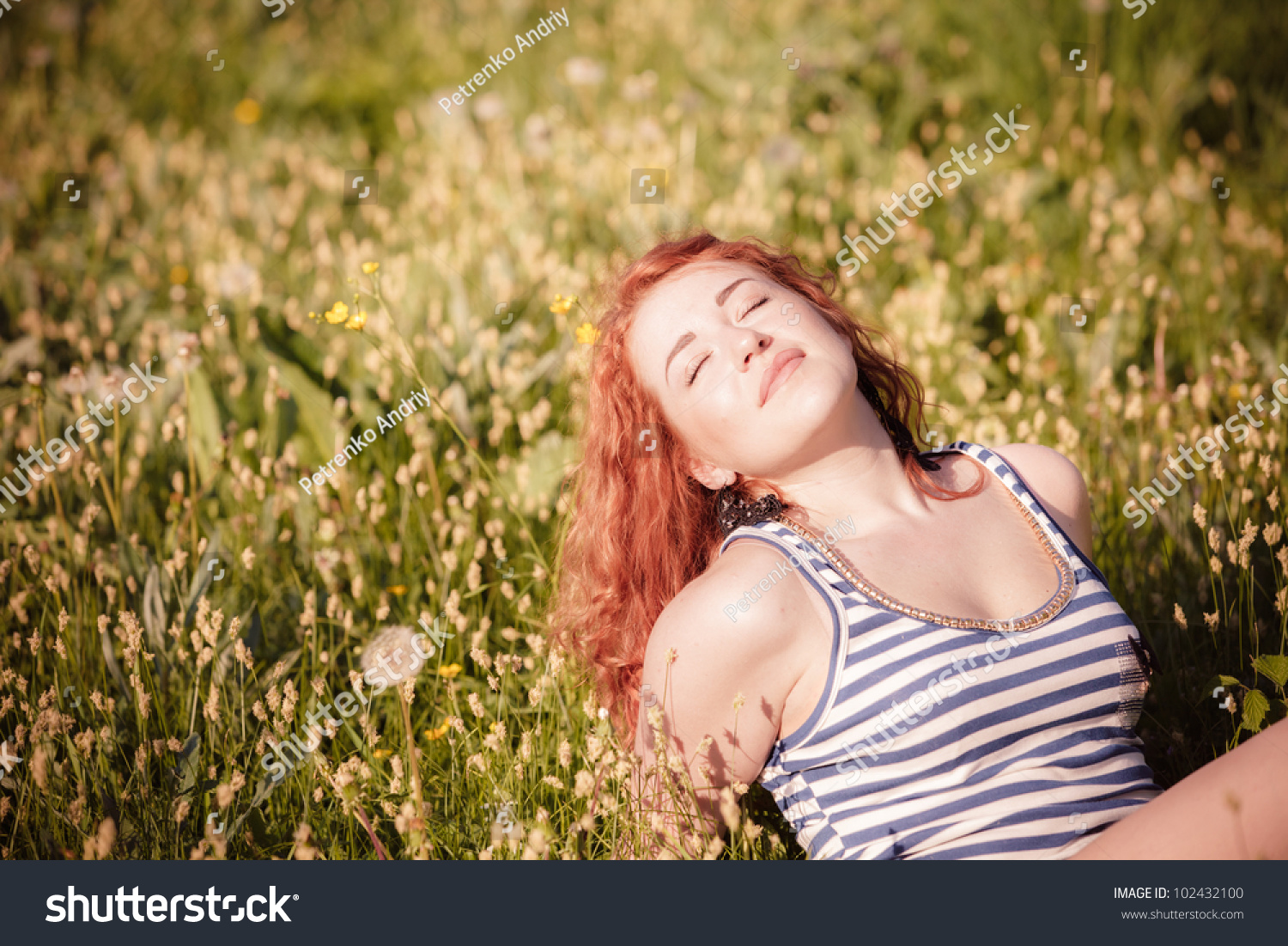 Beautiful Happy Young Woman In The Park On A Warm Summer Day Stock