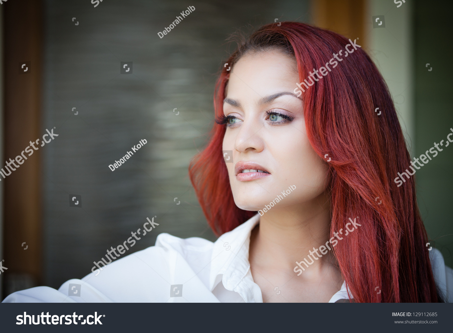 http://image.shutterstock.com/z/stock-photo-beautiful-latin-woman-looking-off-to-the-side-profile-view-129112685.jpg