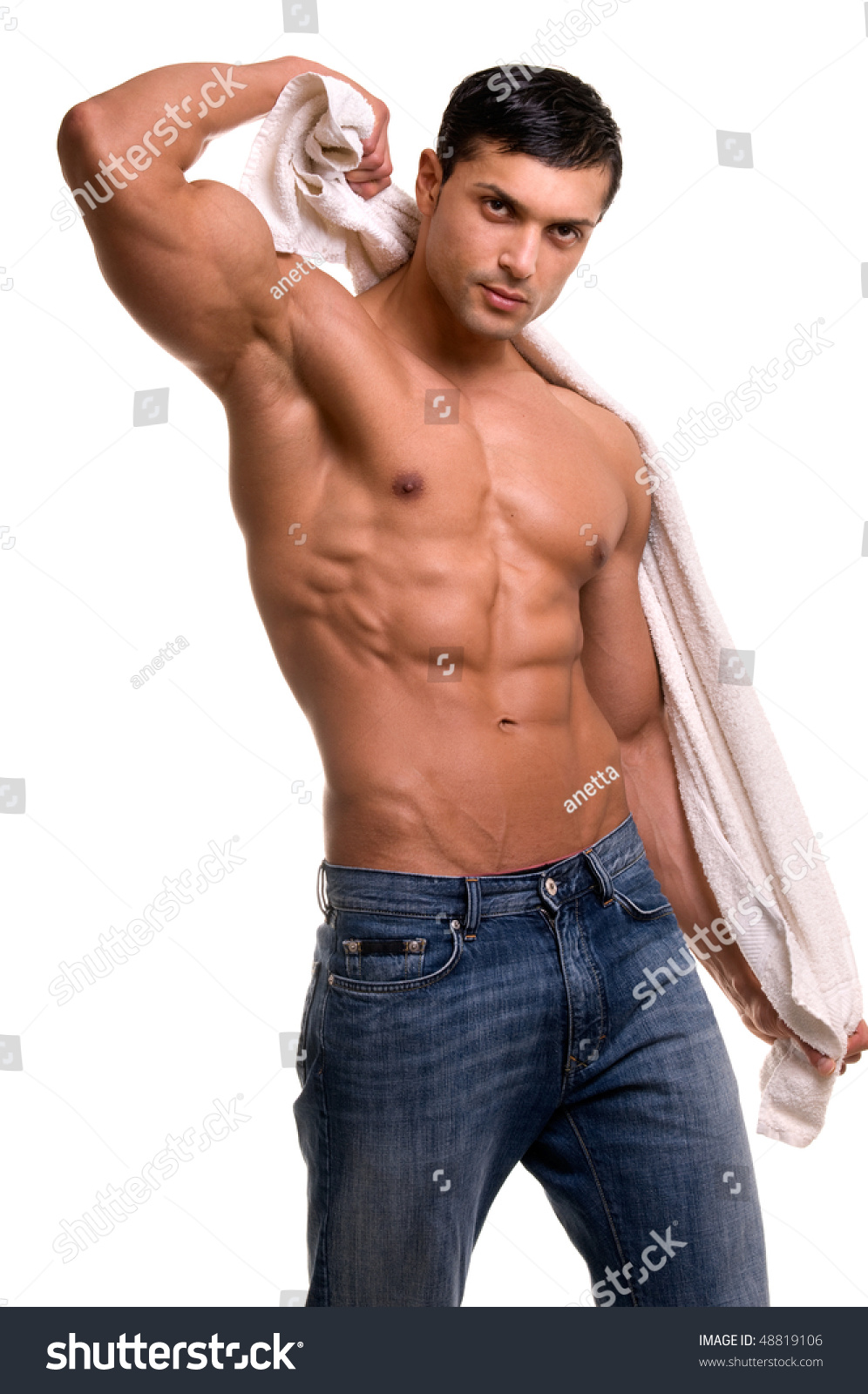Muscular African American Man With No Shirt Holding Towel 