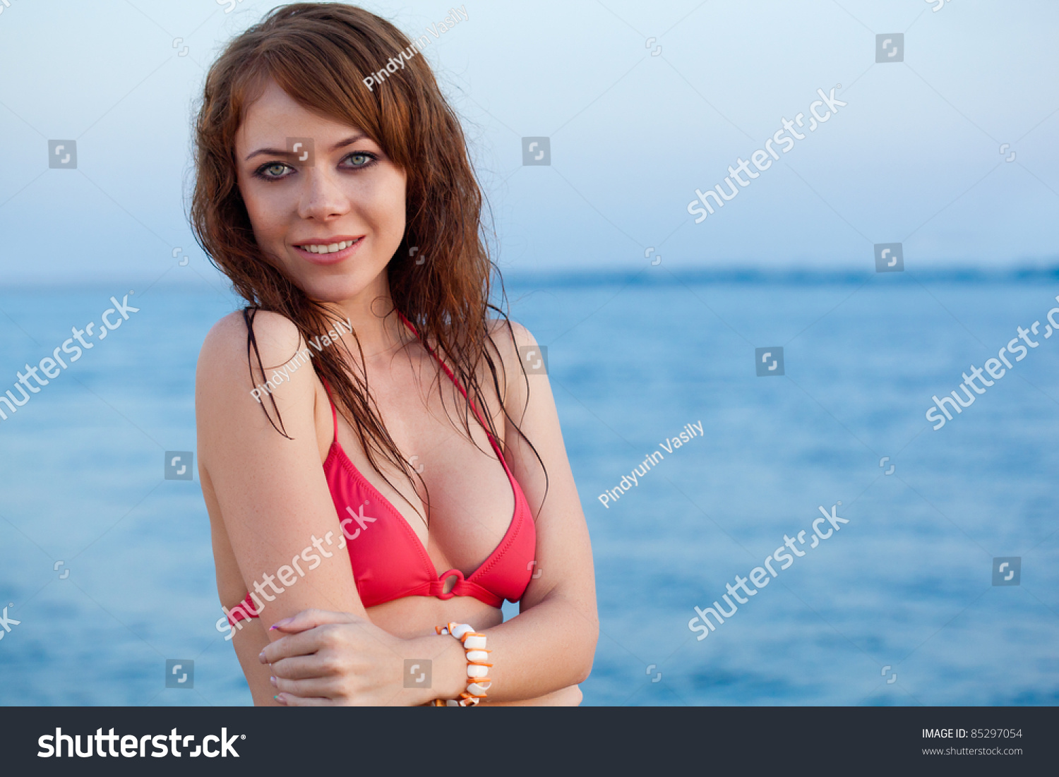 Beautiful Redhaired Woman Wearing Bikini On Stock Photo