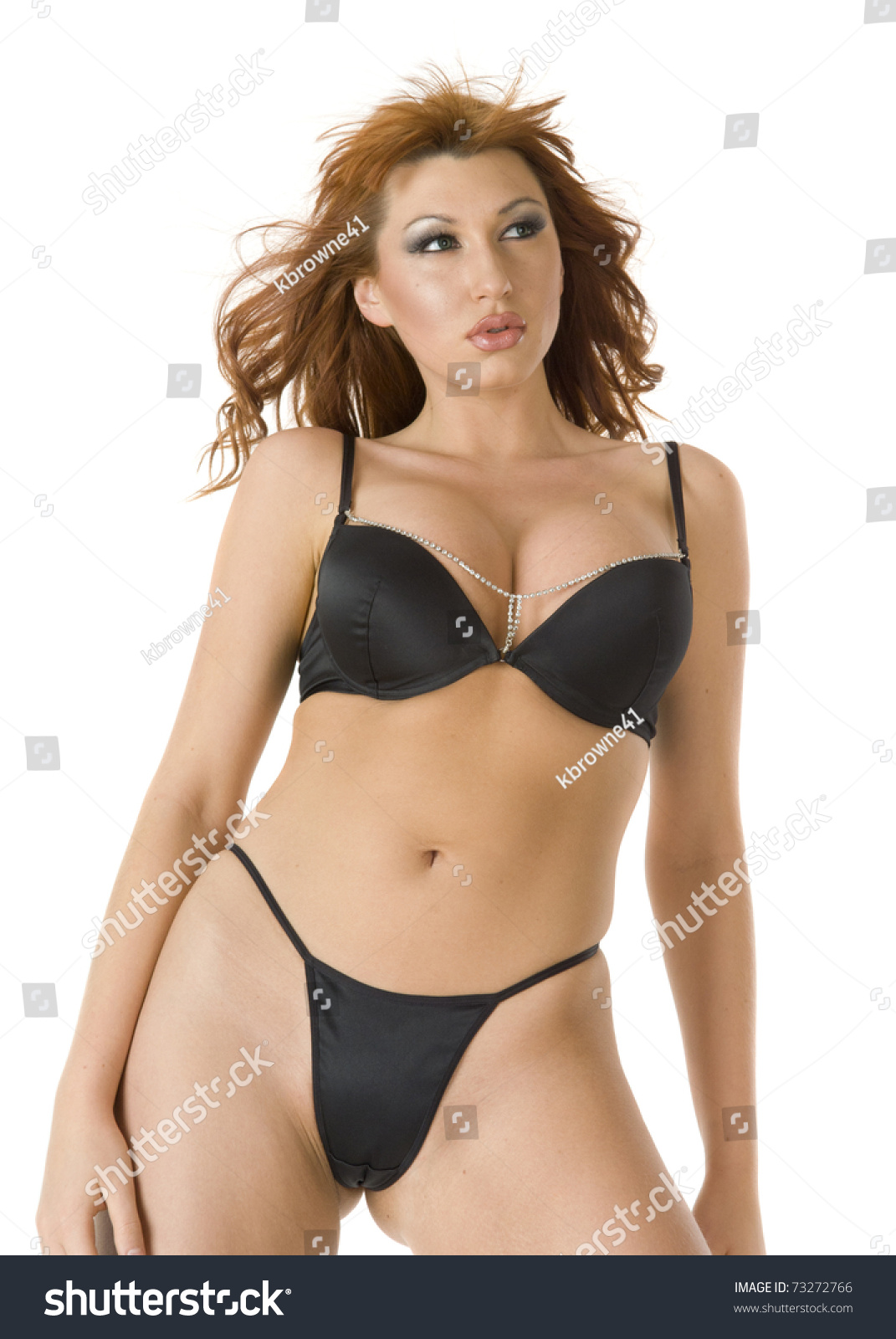 Beautiful Redheaded Woman In Black Bikini Stock Photo