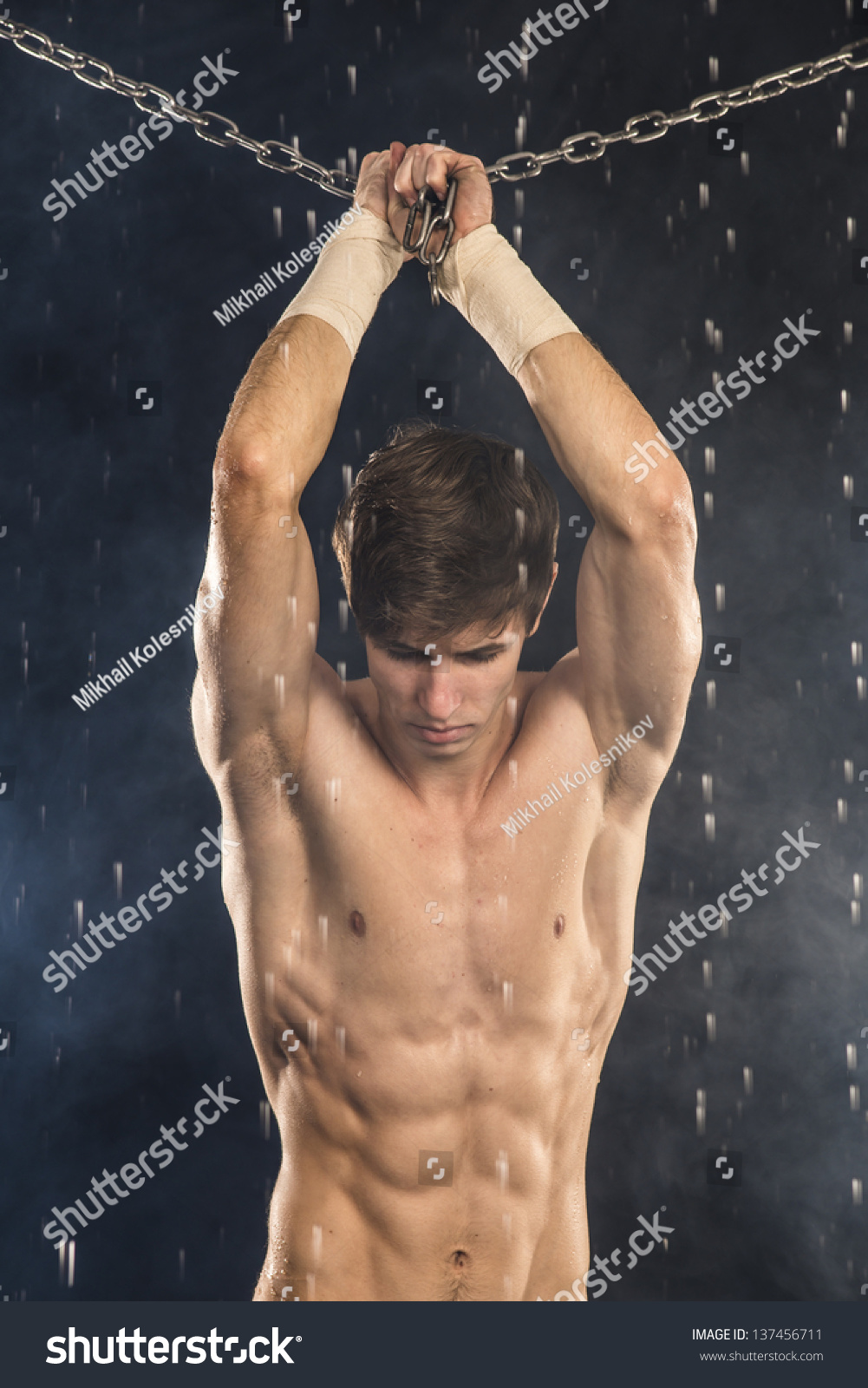 Beautiful Strong Man Chains Aqua Studio Stock Photo