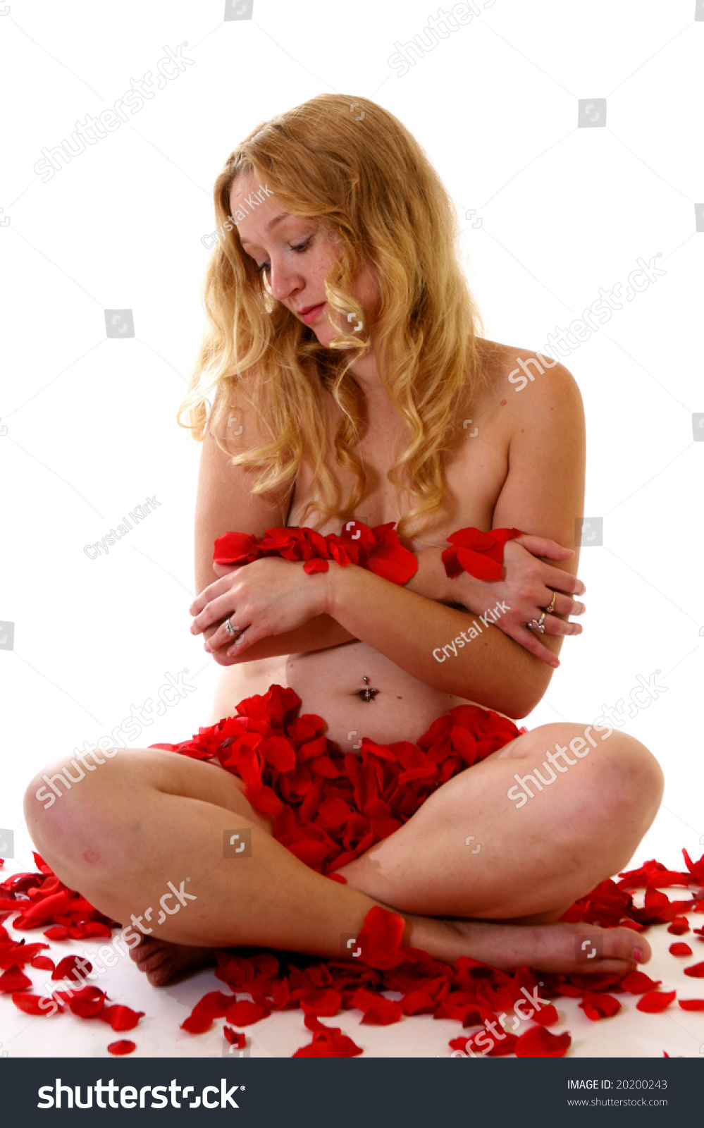 Woman On A Bed Of Rose Petals Stock Image - Image of 
