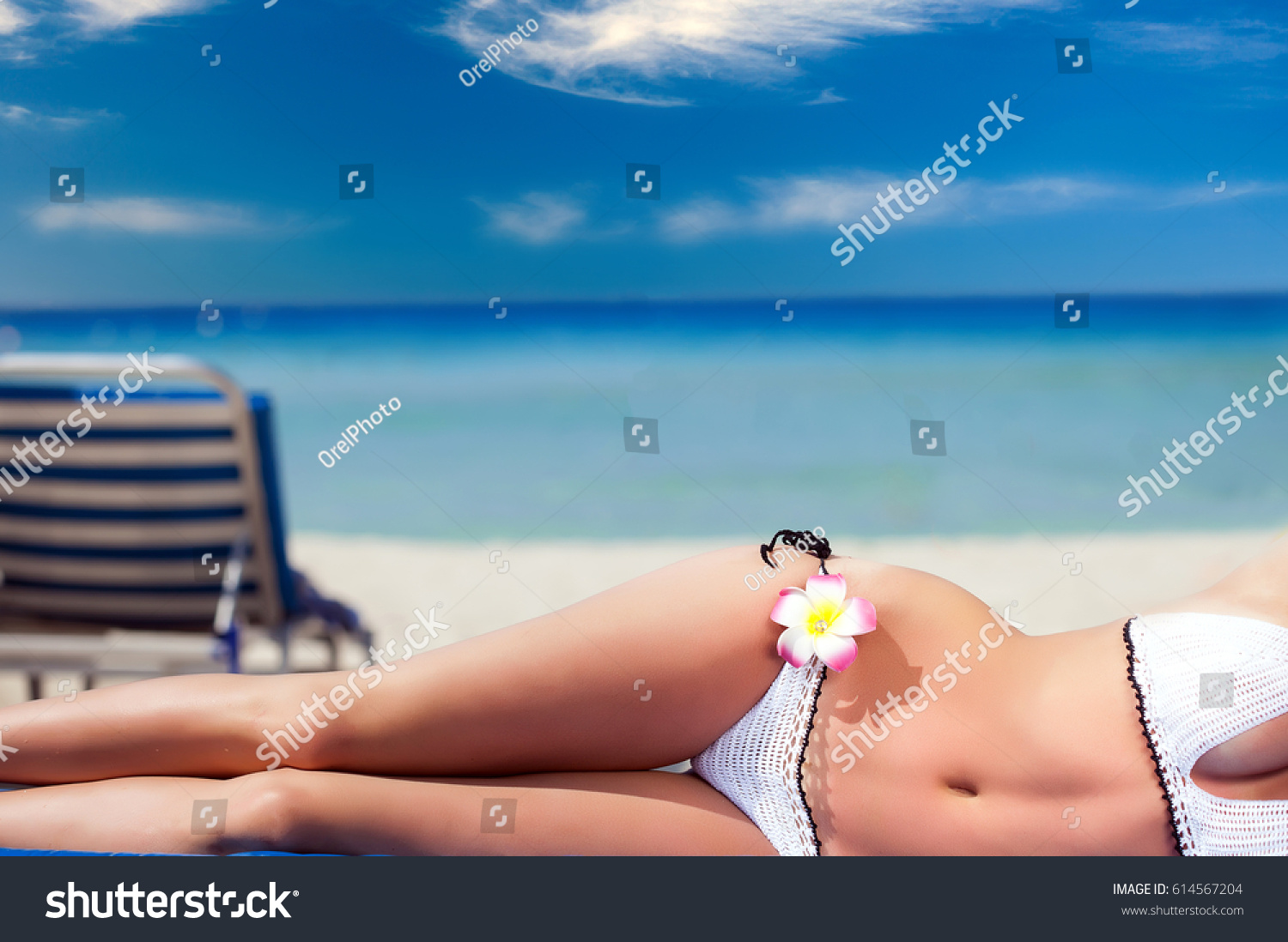 Beautiful Woman Bikini Sunbathing Seaside Stock Photo