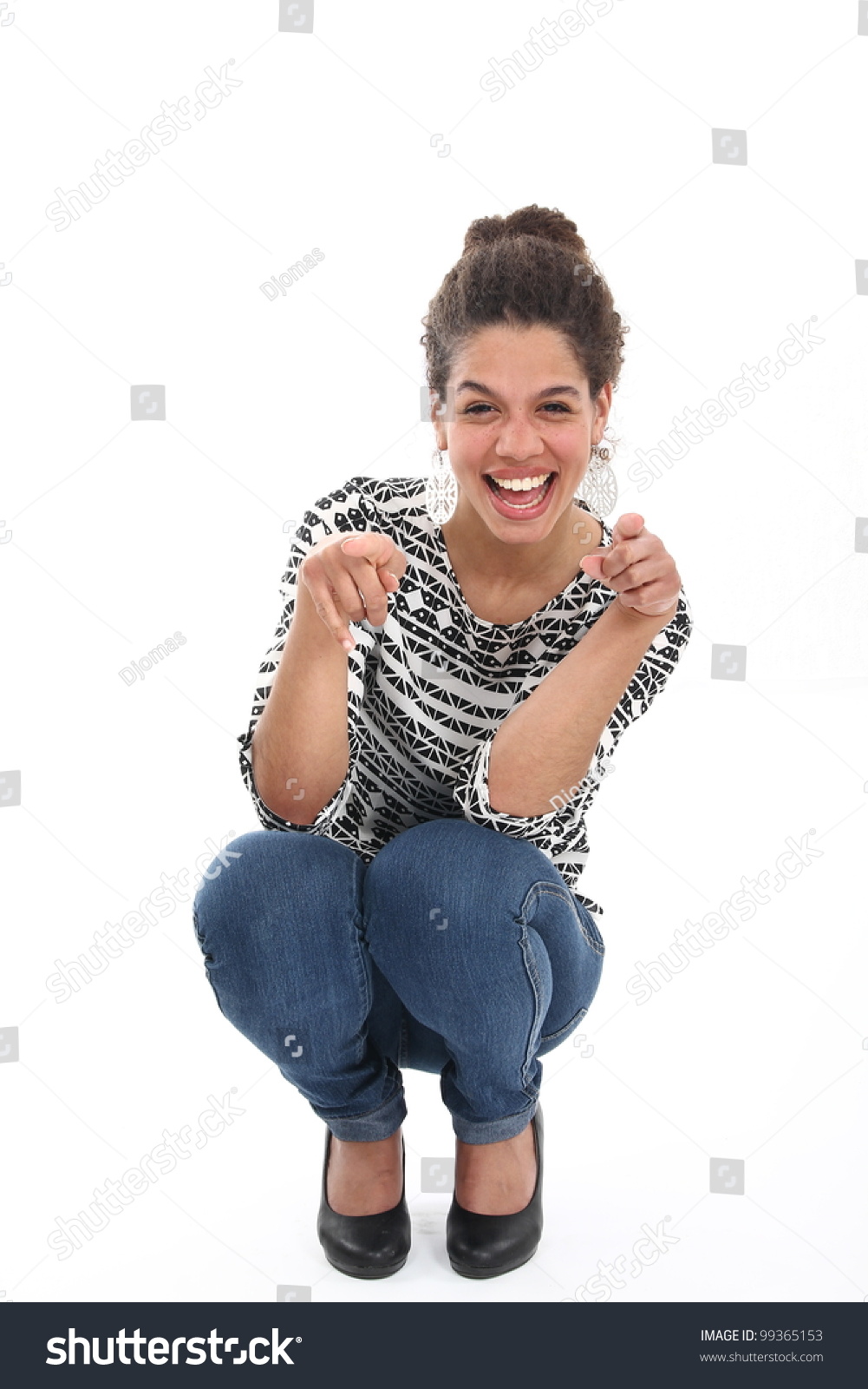 Beautiful Woman Kneeling And Pointing Stock Photo 99365153 Shutterstock