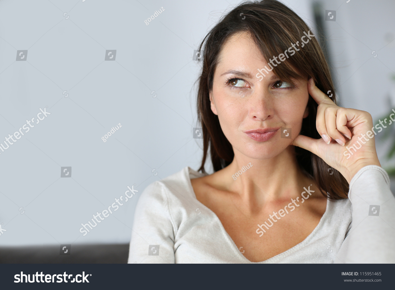 Beautiful Woman With Thoughtful Look Stock Photo 115951465 : Shutterstock