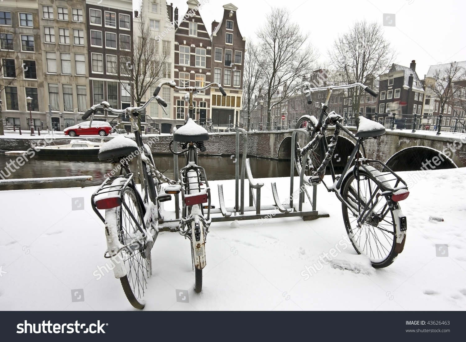 Bikes in the snow in Amsterdam Netherlands in wintertime Bikes in the snow in Amsterdam Netherlands in wintertime