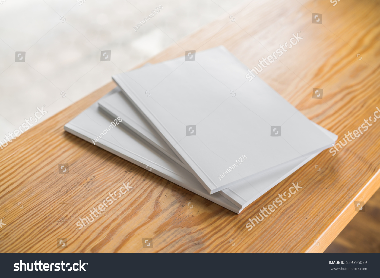 Blank catalog magazines book mock up on wood background Blank catalog magazines book mock up on wood background